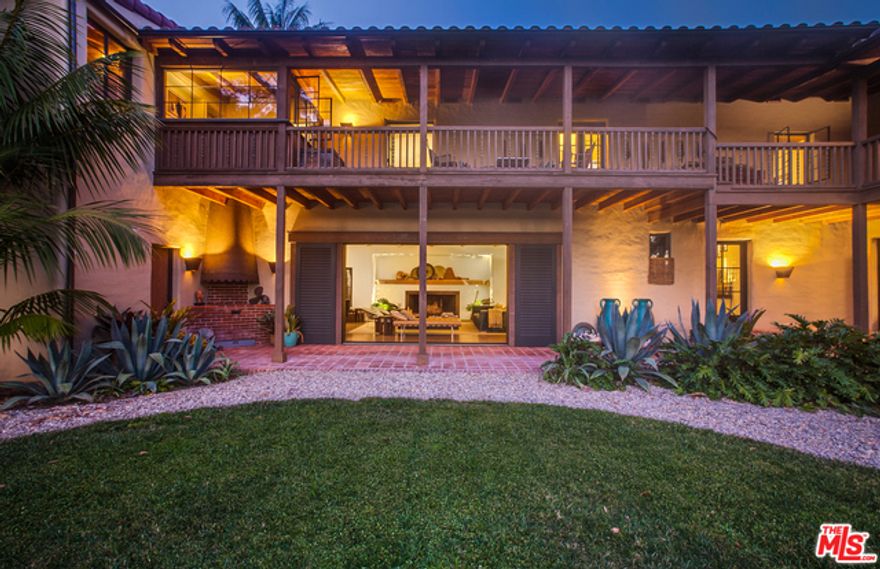 Majestically sited on a 33,000+sf lot on Riviera's Amalfi rim, this authentic John Byers Early California Hacienda offers sweeping views across the canyons to the mountains and the sea. Set back from the street, the gated and elevated setting affords a world of privacy. The beautiful lawn surrounds the pool and several outdoor pavilions. The house itself, lovingly maintained in all its vintage glory, is virtually unchanged from the time it was built in 1933. Perfectly proportioned two story entry, gorgeous living room with oversized fireplace, vintage pub, period fixtures and tile, large multi-room master wing, separate two room guest/staff suite, motor court and much more. The prior owner, Eddie Albert, movie and television celebrity, lived here for a generation. Currently the personal residence of noted landscape designer Jay Griffith, this estate defines glamorous Old Hollywood and cannot be duplicated. Once in a lifetime opportunity to acquire a piece of Los Angeles history.