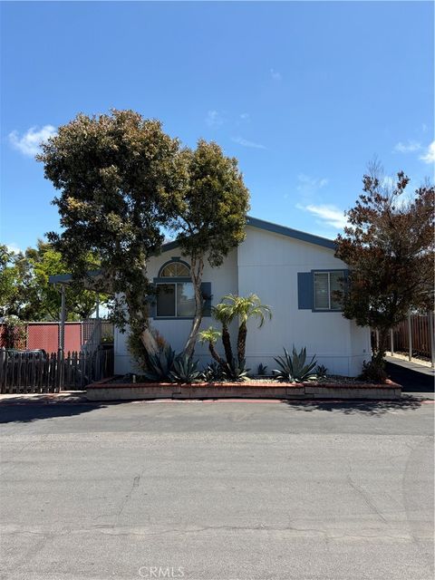Photo of 7051 Ellis Ave #10, Huntington Beach, CA 92648 (MLS # OC26091120)