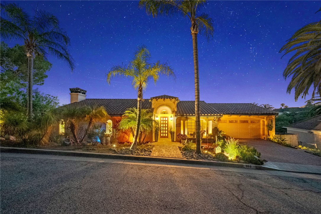 Looking for something special with exceptional VIEWS FOR DAYS in the coveted hills of Brockmont? Opportunities like this are exceptionally rare in one of Glendale's most desirable and picturesque neighborhoods. After years of being appreciated and cared for, this finely crafted, distinguished custom estate is being offered to the public and is ready for its new owner.
Built by its sole owner, a master builder who contributed to the restoration of Frank Lloyd Wright’s Ennis House and Pasadena’s historic Greene & Greene homes, this residence reflects a true appreciation for fine craftsmanship, architecture, and artistry. His legacy lives in every detail of this thoughtfully designed home.
Awaken each morning to serene beauty and panoramic hillside views from private balconies off every bedroom and the main-level living spaces. In the evening, unwind in the spa while the city lights shimmer below and Universal Studios fireworks light up the sky, no theme park ticket needed.
Inside, dramatic beamed cathedral ceilings and a large stone-and-glass fireplace anchor the open-concept living area. Custom glasswork by local artist Jackie Steimke, hand-plastered walls, freshly painted interiors, and solid handcrafted doors are complemented by distinctive lighting throughout, including a striking Frank Lloyd Wright–inspired fixture in the office/flex space, highlighting the home’s unique architectural character.
The open kitchen boasts uninterrupted views and its own charming arched plaster fireplace. Wine lovers will appreciate a beautifully designed custom wine cellar. The spacious primary suite features a private balcony, oversized walk-in closet, and luxurious en-suite bath.
Designed for entertaining, the home also includes a 400 sq ft guest suite with its own bathroom-plumbed and wired for a kitchen, ready to be completed to your specifications.
With over 10,000 sq ft of land, there’s ample space to create your own outdoor oasis. Minutes from premier shopping, fine dining, and top-rated Glendale schools, this is a once-in-a-generation chance to own a true architectural gem.