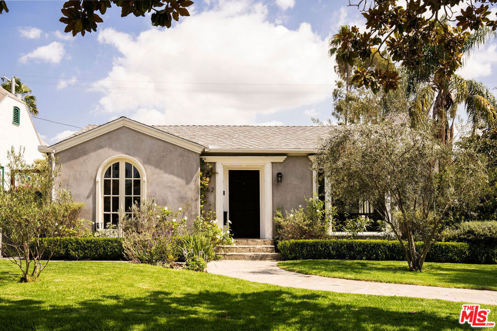 If you LOVE Larchmont this home can't be beat! Welcome to this light filled and spacious traditional, just 2 blocks away from the shops and stores of coveted Larchmont Blvd. Located in one of the city's most desirable neighborhoods, Windsor Square HPOZ, on one of its best blocks Lucerne Boulevard in Third Street School District. This stunning single level home blends classic elegance with modern comfort and sophistication. Wind your way up the stone, curved pathway where you are welcomed curb appeal and curated landscaping, manicured olive trees, jasmine and white roses. Large, wooden door opens to a spacious retreat, where you are instantly greeted by wide plank hardwood floors and an open concept floor plan with high ceilings and ease of entertaining. Cozy up by the gas burning fireplace, where you can unwind with your favorite book, watch TV and hang with your brood. Natural light abounds as it pours in from floor-to-ceiling bay windows. The kitchen is a chef's dream boasting high-end Viking appliances, custom oven hood, deep farm sink, warming drawer, beverage fridge, ample storage and a massive marble kitchen island. Separate dining room continues the entertaining atmosphere. Two bedrooms both with their own ensuite baths and large closets complete the functionality. Plus a guest powder room and laundry area for ease of living. Finally wind your way to the primary where the scale and space is something out of a magazine! It offers a walk-in closet and ensuite bath with separate glass enclosed shower and separate tub. Dual French doors open out to a tranquil, secluded world of hedged privacy where you can enjoy those long, summer nights under the stars, an oasis ideal for relaxation. The backyard has multiple options for al fresco dining, BBQing, lounging, entertaining, or just entertaining friends. Additional side dog run makes for the perfect play area. Separate detached bonus space with built in desk and storage is perfect for office, gym or entertaining. Finally a large, detached two car garage, easily accessible from 2nd street, with direct yard access offers ample storage with built-in floor to ceiling cabinets, Bathed in magical light at every turn, and offering the perfect blend of form, function and ease of living. This home is waiting for your memories to write themselves. The house measures 2324 Sqft in the main house and Bonus Space (not garage) is 290 Sqft per floor plan. Situated amongst the best Larchmont Village has to offer: trendy, new Levain Bakery, Go Get 'Em Tiger, Starbucks, Salt and Straw, Village Pizzeria, Sua, Great White, Kreation. Savor the freshest produce and artisanal goods at the Farmers Market on Wednesday & Sundays. Located in the desirable Third Street School District. Ideally located and move-in ready, this is the one to call home.