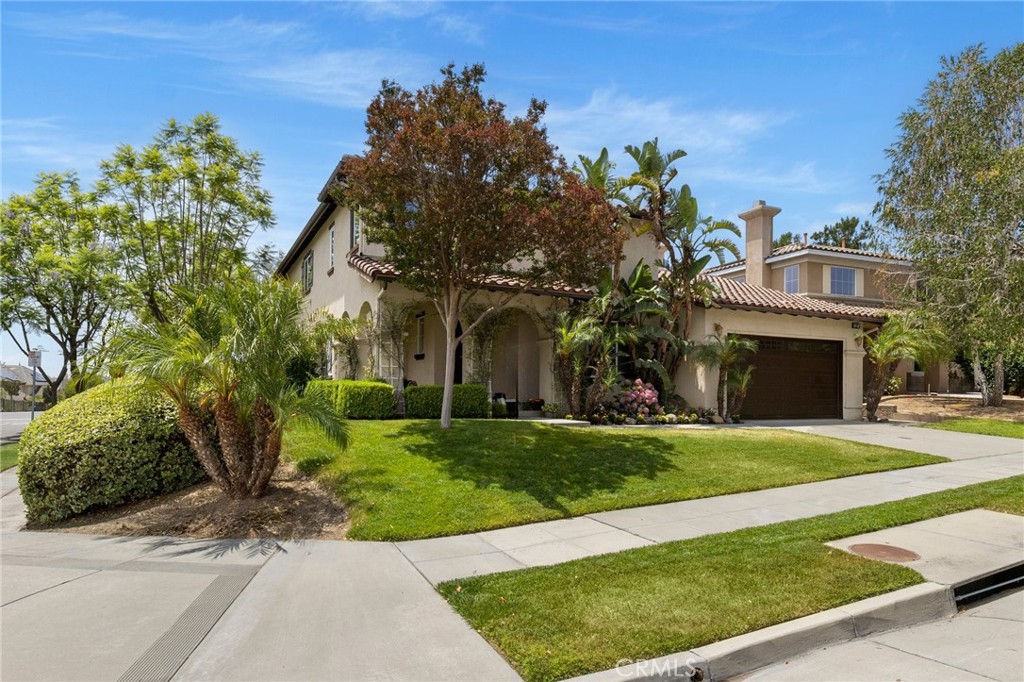 MOVE IN READY! Large Corner Lot. Incredible view. Tankless water heater. Water purification system. Spacious, open. Dual air conditioning system for upstairs & down. Beautiful durable last for ever paver tiles that compliment the elegant design of this spectacular home. Downstairs master suite with built in library and double walk in closets. Walk in Shower. Spa tub. Soft lighting. Lots of natural sunlight in every direction. Giant chef's kitchen with breakfast nook and center island. Work from home at our in home office with plenty of room for the kids to study or never have to go into the office! Beautiful contemporary and this home looks like a model home! A charming street. Sit out at the outside balcony and star gaze or feel the gentle breezes and city lights. Charming front porch veranda style with plenty of room to sit out in your rocking chair and relax the day away! The back yard is designed for outdoor entertaining complete with a gazebo to enjoy your morning coffee and breakfast. Lots of fruit trees and room for the vegetable garden. Orange, Lemon, basil, mint and more! This beautiful neighborhood is just blocks away from the shops at the Colonies. Never have to leave home as everything is right in your own back yard. Custom wood shutters, lots of great window space, commanding staircase, butlers pantry, vaulted dramatic ceilings, recessed lighting, gas fireplace, too many extras to list! Come on over and stay awhile and enjoy all that this master planned community has to offer. Walking trails around the corner and the Mountains of Mt. Baldy are calling you but also just minutes to transportation, restaurants and shops. Ontario airport just about a 20 minute drive away with out traffic. This location has it all. Garage is an oversized tandem garage with lots of storage Very quiet and private yet close to where you want to be Cabinets just painted, interior painted, exterior painted, fresh landscaping! New hardware, new lighting, new wood shutters, brand new closet! Giant bedrooms with huge closets! Such great storage space! Multiple uses for each room. formal entryway, formal living room, formal living room, breakfast nook. Huge open space. Brand new ceiling fans! Beautiful iron side gates. Back yard B-B Que station with plenty of room for outdoor dining. Out door chefs grill. Plenty of room for all of your neighbors, friends and family. Pet friendly neighborhood. Custom designed back yard with brick accentuated planter boxes. Move in now