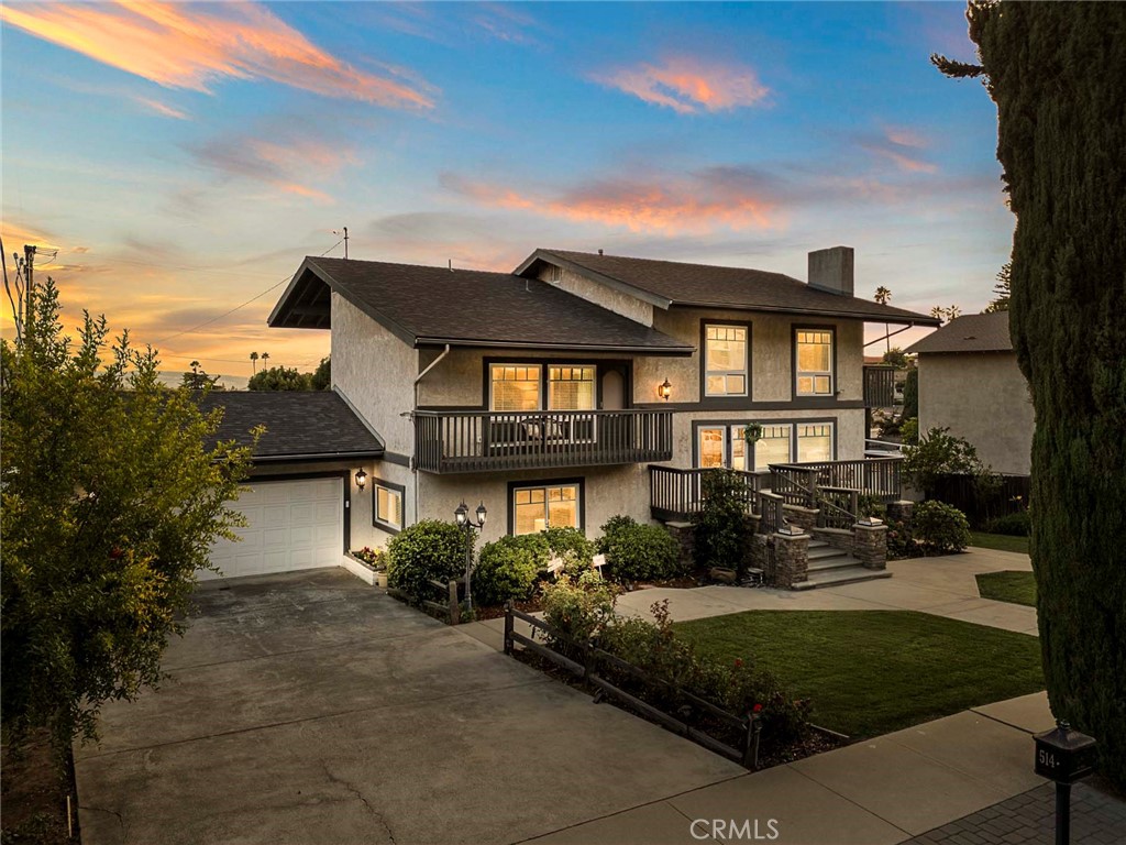 Picturesque property, located on a quiet cul-de-sac in North Glendora is for sale for the first time in 38 years. Great curb appeal with a grand entry is this spacious & remodeled tri level home. Offering 4 bedrooms, 2.5 baths and 3,562 sq ft of living space, on an expansive 12,156 sq ft lot. Upon entering the front door you are welcomed by a cozy living room with gleaming hardwood floors & a wood burning fireplace. Cabinets & counter tops galore you have in the Gally Kitchen, double ovens, a 5 burner Induction electric cook top & stainless steel appliances, water filter system under the sink & a breakfast nook. A large dining area opens to a covered deck that is 41 X 12 made of Treks, where you can enjoy the city light view while you BBQ in a natural gas grill & entertain year around. You can oversee the expansive yard with plenty of room for children to play, prefect multi purpose activity pad for Pickleball, basketball etc. or to add a pool & spa. The Primary bedroom has a wall of closets & remodeled bathroom with a walk in shower, soaker bathtub, large mirror & stone countertops. Separated for privacy are 3 additional bedrooms & another remodeled bathroom with a large walk-in shower and nice vanity. There is another room that would be great for an office, sewing room or another bedroom.The large family room is located on the lower level with custom built-in bookcases & a very useful cupboard for more storage. Step down to another large room approx.400 sq ft that can be used as a home gym, offices, den or even turned into a theater. You can access the backyard from this level through the French doors to a concrete patio area with fruit trees, lush grass & block wall fence. Additional features include Centralized alarm & fire system, double pane windows, recessed lighting, crown moldings, upgraded electrical, newer carpets, ceiling fans & a 2-car oversize garage. There is a-paved driveway for 5 additional cars. This home features newly installed energy efficient solar panels & a plug for EV charging station that is paid for. Class A fireproof, composition roof was installed in 2020. Located in the coveted Glendora School District, Sandburg Jr. High, LaFetra Elementary School & close to St Lucy's Priory, Azusa Pacific University & Citrus College. You can enjoy the close proximity to the Glendora Village for great shopping, restaurants, Library, Finkbiner Park, bus line and Gold line. Priced to sell, this property won't last & is ready for the next family.