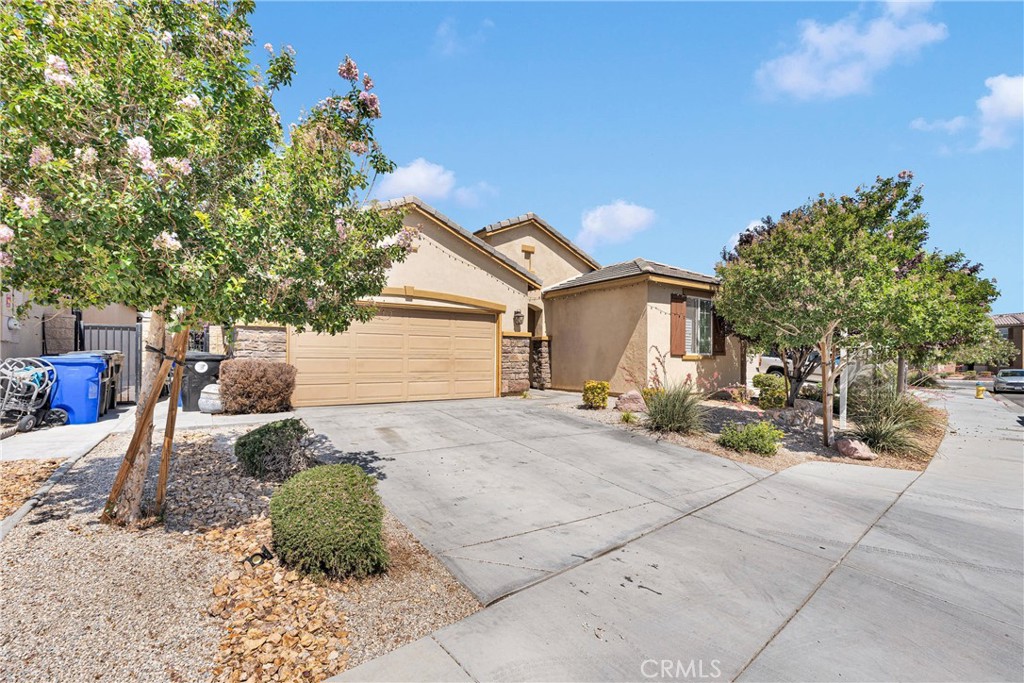 Welcome to this beautifully maintained 3-bedroom, 2.5-bathroom home located in a desirable Victorville neighborhood. From the moment you arrive, you'll be impressed by the home’s excellent curb appeal, showcasing pride of ownership and a welcoming atmosphere. Step inside to discover a thoughtfully designed layout that offers both comfort and functionality, with spacious living areas perfect for everyday living and entertaining.
The true highlight of this home lies in its expansive backyard—a perfect setting for relaxing and entertaining alike. Enjoy the outdoors year-round under the covered patio, complete with a built-in BBQ station and bar area, making it an ideal space for weekend cookouts, celebrations, or casual evenings with family and friends. The yard is designed for low maintenance yet offers plenty of room for kids to play or to add your personal touches.
Energy efficiency is another key feature, thanks to the leased solar system that helps keep utility bills down while supporting a more sustainable lifestyle. Situated in a family-friendly community, the home is conveniently located near shopping centers, restaurants, and everyday amenities. Plus, with an elementary school just minutes away, it’s perfect for families with young children. This home truly offers the ideal blend of comfort, style, and convenience.