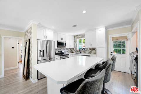 Photo of 15441 Lemarsh Street, San Fernando, CA 91345 (MLS # 26867505)