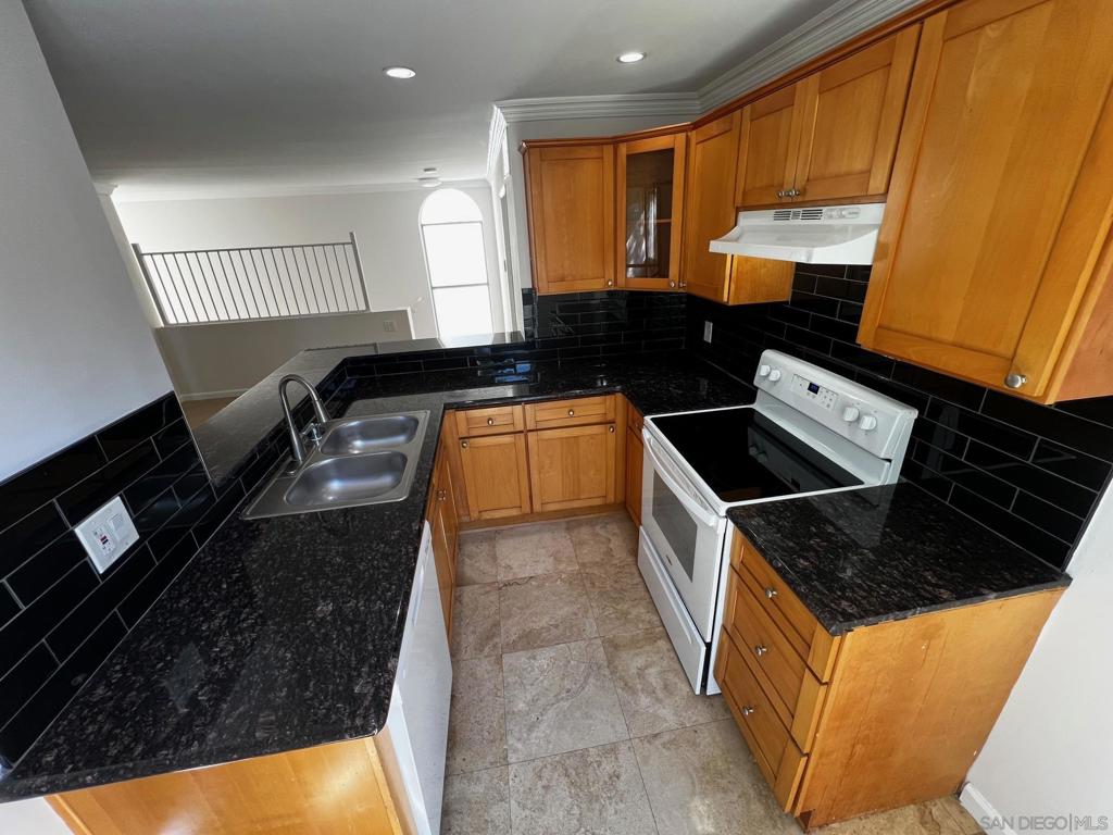 2 bedroom condo. remodeled & upgraded. large $$$ must have been spent. All of the living space is on the 2nd floor. balcony. private quiet location within the complex. central heat and air. Close to SDSU. Carport close to home.