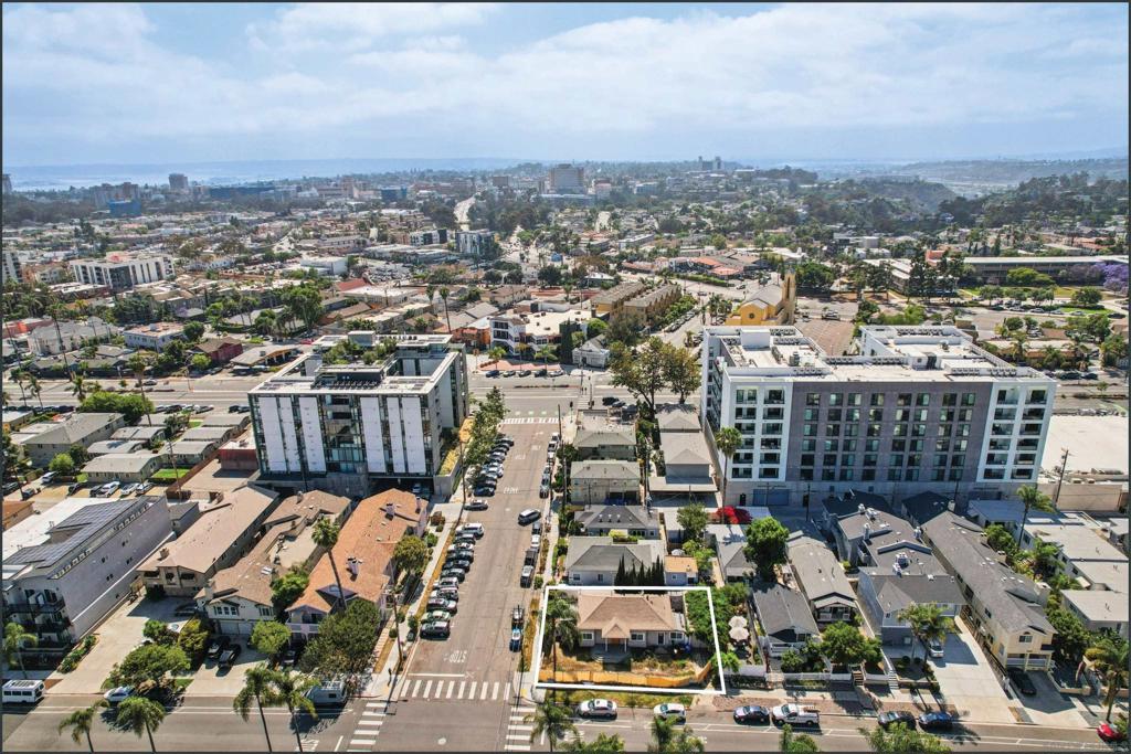 4104 Georgia Street presents a rare, shovel-ready opportunity to develop 14 residential units in the heart of Hillcrest—one of San Diego’s most vibrant and supply-constrained neighborhoods. Situated on a ±3,766 square foot lot, the site is fully entitled and permit-ready, with approved plans for a 7,552 rentable square foot, four-story building featuring a mix of eight one-bedroom and six two-bedroom units. The project falls under the City’s Complete Communities Tier 3 program, allowing a 6.5x FAR with no parking requirement, maximizing density and walkability. It includes one very-low-income unit, making it eligible for CTCAC/HCD incentives and other affordability bonuses. The entitlement package also features transportation-related amenities like co-working space and an on-site bike repair station, enhancing compliance and tenant appeal.