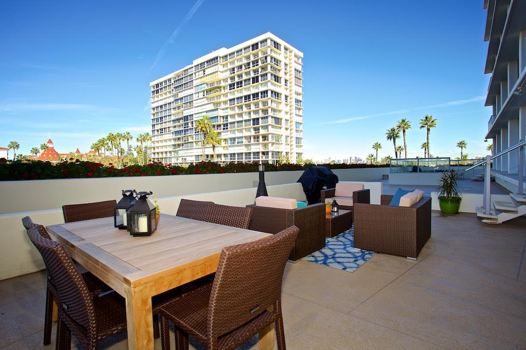 Stunning terrace level unit with water and bay views and a picture framed view of the Hotel Del! Remodeled in 2013, this spacious floor plan offers an ease of living which is characteristic of this resort lifestyle. Beach access out your back door, along with all the other amenities of the Shores. 8 tennis courts, 4 swimming pools, 2 clubhouses, workout facility. Enjoy your over sized patio and ocean breezes while you take in the sunset over dinner. Offered fully furnished. Neighborhoods: Coronado Shores Equipment: Fire Sprinklers,Garage Door Opener, Range/Oven Other Fees: 0 Sewer: Sewer Connected Topography: LL