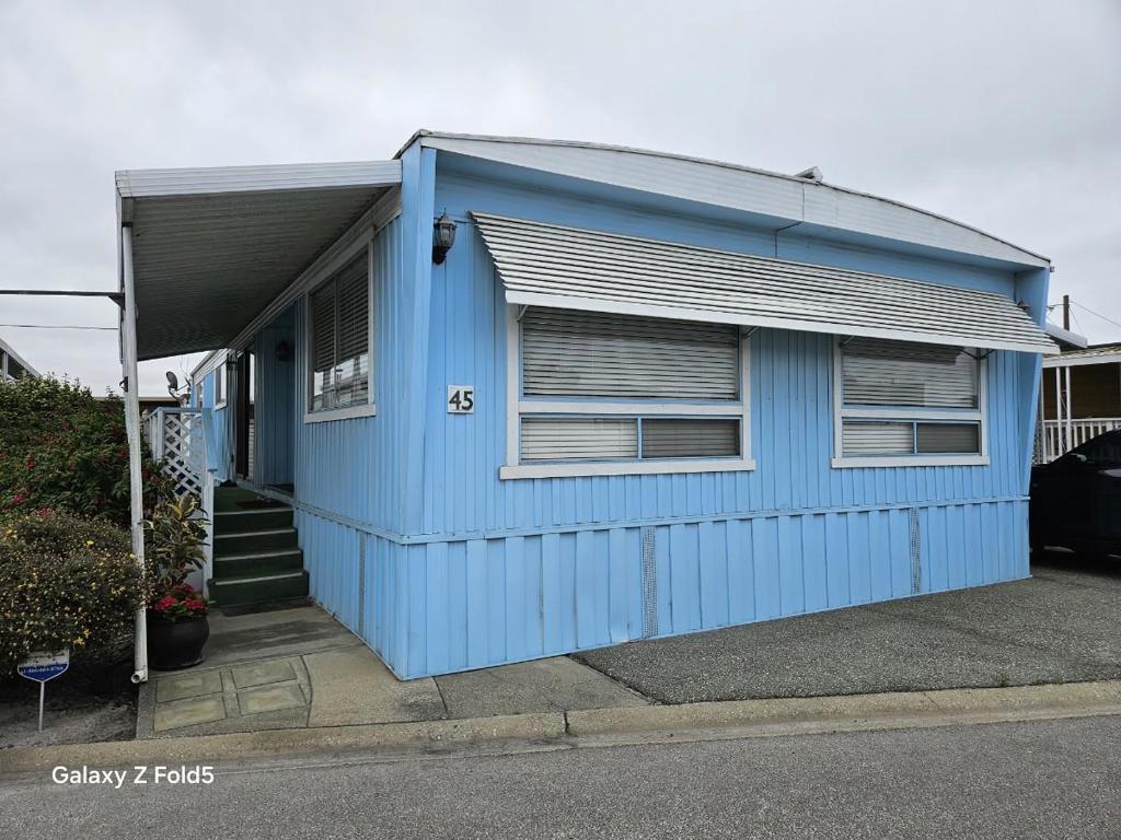 Located in a community exclusively for residents aged 55 and over. It is a spacious 1,440 SqFt manufactured home. Inside, you will find a bright and generously sized primary bedroom with it's own bathroom - tub and walk-in shower. There is a 2nd well sized bedroom and a separate full bathroom - perfect for guests or additional family members. Laundry area conveniently located next to the kitchen providing an efficient layout for everyday chores. Washer and dryer included! Outdoors there is space designated for growing organic vegetables - ideal for those who enjoy gardening. Additionally, the property includes two well-built storage sheds offering ample extra storage. This community offers exceptional convenience with banks, restaurants and shopping centers all within walking distance. Plus, Highway 101 is just minutes away, making commuting and travel easy. Furniture may be included if an agreement is made.
