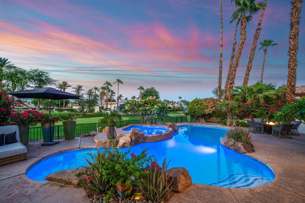 Welcome to the Prestigious Rancho La Quinta Country Club! This highly desirable, fully furnished & remodeled Palacio 1 plan is perfectly positioned on the 9th fairway of the Robert Trent Jones Jr. golf course, offering breathtaking views of the fairway & surrounding mountains. Designed with timeless Spanish elegance, this spacious 4-bedroom, 4.5-bathroom home includes a charming detached 1-bedroom, 1-bath casita with a kitchenette ideal for guests, in-laws, or private office space, all centered around a tranquil courtyard with fountains. Inside, soaring ceilings and a flowing open-concept layout create a warm yet grand feel. The light-filled family room and kitchen opens to the backyard oasis, where you'll find an entertainer's dream: a built-in BBQ, expansive patio, and a remodeled sparkling pool and spa - all with panoramic golf course and mountain views. A generous sunny side yard offers room for a bocce court, putting green, or garden. The luxurious primary suite provides direct access to the pool and backyard and boasts a charming fireplace, dual walk-in closets, plus a spa-inspired bath. Each guest bedroom includes its own ensuite bath for ultimate comfort and privacy.Just minutes from shops, fine dining, and the charm of Old Town La Quinta, this home offers the perfect blend of desert retreat and full-time residence. Rancho LQ amenities include use of the clubhouse, fitness center, tennis court, pickleball, bocce, main pool and 8 satellite pools, dog park and planned activities. HOA fees includes upgraded streaming TV service, internet, and trash pickup, frontyard maintenance, and 24-hour guard gate security.With proven seasonal rental history and priced to sell, it's a rare opportunity to own in one of La Quinta's most sought-after communities. This is resort living at its finest.