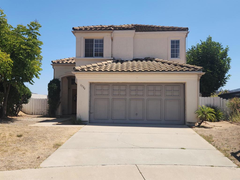 Rancho San Diego Gem on a Quiet Cul-de-Sac! Welcome to this inviting two-story home featuring 3 bedrooms and 2.5 baths in a highly sought-after Rancho San Diego neighborhood. The spacious Primary suite offers a walk-in closet and plenty of natural light. Enjoy the cozy ambiance of a dual-sided fireplace shared between the living and family rooms, perfect for relaxing or entertaining. The kitchen boasts tile counters, while the attached 2-car garage adds everyday convenience. Located near top-rated schools, the library, shopping, and popular restaurants, this home also features a newer A/C unit to keep you comfortable year-round. Positioned on a peaceful cul-de-sac, the backyard enjoys refreshing afternoon breezes—ideal for unwinding at the end of the day! Needs a little refreshing & personalization! Don’t miss the chance to make this desirable Rancho San Diego property your own!