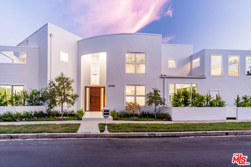 Property is currently occupied. Please do not disturb tenants without prior appointment. Impeccably Remodeled Brentwood Corner Lot Estate. Welcome to this highly desirable and beautifully remodeled Brentwood residence, offering 4,337 sq ft of refined living space (plus an additional 360 sq ft in the garage) on an expansive corner lot with 140 feet of frontage. This five-bedroom, six-bathroom home seamlessly blends modern elegance with warm livability, showcasing thoughtful design and high-end finishes throughout. Enter through lush, manicured landscaping to a grand front entrance featuring a solid wood door, soaring ceilings, and custom lighting that sets the tone for the entire home. The open-concept layout flows effortlessly into a chef's kitchen equipped with custom cabinetry, stone countertops, premium stainless steel appliances, and an oversized center island, perfect for everyday meals and elevated entertaining. The adjoining living area features a sleek electric fireplace and expansive windows that overlook the private backyard oasis. Step outside to enjoy a large heated pool, generous patio space, privacy walls, and impeccably maintained grounds, ideal for both serene relaxation and vibrant gatherings. Retreat to the luxurious, oversized primary suite with a boutique-style walk-in closet complete with custom built-ins, and a spa-like bath with a soaking tub, glass-enclosed shower, and dual vanity. Each of the additional four bedrooms is spacious, bright, and includes ample closet space. Additional highlights include a two-car garage, wet bar, abundant storage, new finishes throughout, and large windows that flood the home with natural light. Located near local schools, UCLA, beautiful parks, premier shopping; and just around the corner from the iconic Golden Girls House, this is Brentwood living at its best. Come experience life on Leven Lane where elegance meets comfort in one of LA's most coveted neighborhoods.