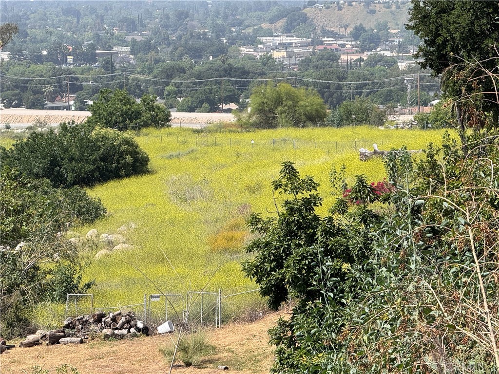 ATTENTION HOME BUILDERS, INVESTORS AND VISIONARIES Four parcels totalling 3.09 Acres. It's you call to do one or more home estates. One parcel has the road access from Arrowhead Road which turns into Old Waterman Canyon Rd. and it is a cul-de-sac. Beautiful views of the valley from here. A secluded natural paradise to your own disposall. Away from the hustling and bustling of the city, yet close to all amenities right at the base of the foothills. Plenty of nature on an almost flat land. Nothing to the south, so the view is unobstructed. All utilities available as per county records. Buyers and Buyers agents to do their own independent due diligence. No guaranties or warranties.