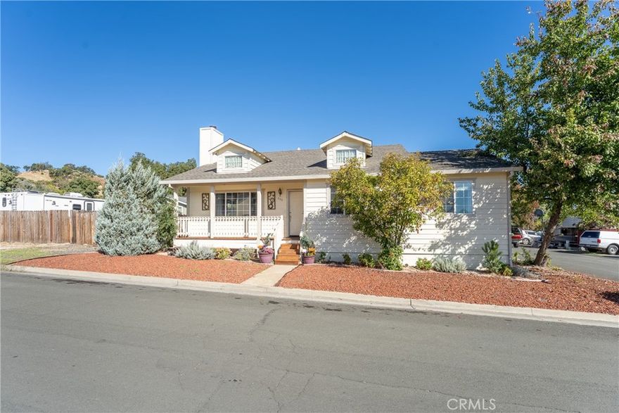 Nestled in the sought-after Island View Estates community of North Lakeport, this home blends comfort, function and the Lake County lifestyle. This three-bedroom, two-bath home was built in 2003 and welcomes you with vaulted ceilings and a flowing open-concept layout that makes everyday living and entertaining a breeze. The spacious living room, anchored by its cozy wood-burning fireplace, offers a warm, inviting place to relax, while the kitchen and dining area are a bright central hub for meals and gatherings. The back patio is perfectly sized for barbecues, outdoor dining or simply enjoying the evening breeze. Ownership here also includes beach rights, so you can walk down to the water for a swim, launch a kayak, or watch the sun set over Clear Lake. This home sits on a corner lot of approximately 5,800 square feet and benefits from low HOA dues, giving you both a sense of community and space to make your own. Schools, shops, and local conveniences are just minutes away, so you're close to everything yet still tucked into a peaceful neighborhood. Whether you're looking for a full-time residence or a weekend retreat, this property offers a rare blend of open living spaces, outdoor amenities, and lake access in one of Lakeport's most desirable settings.