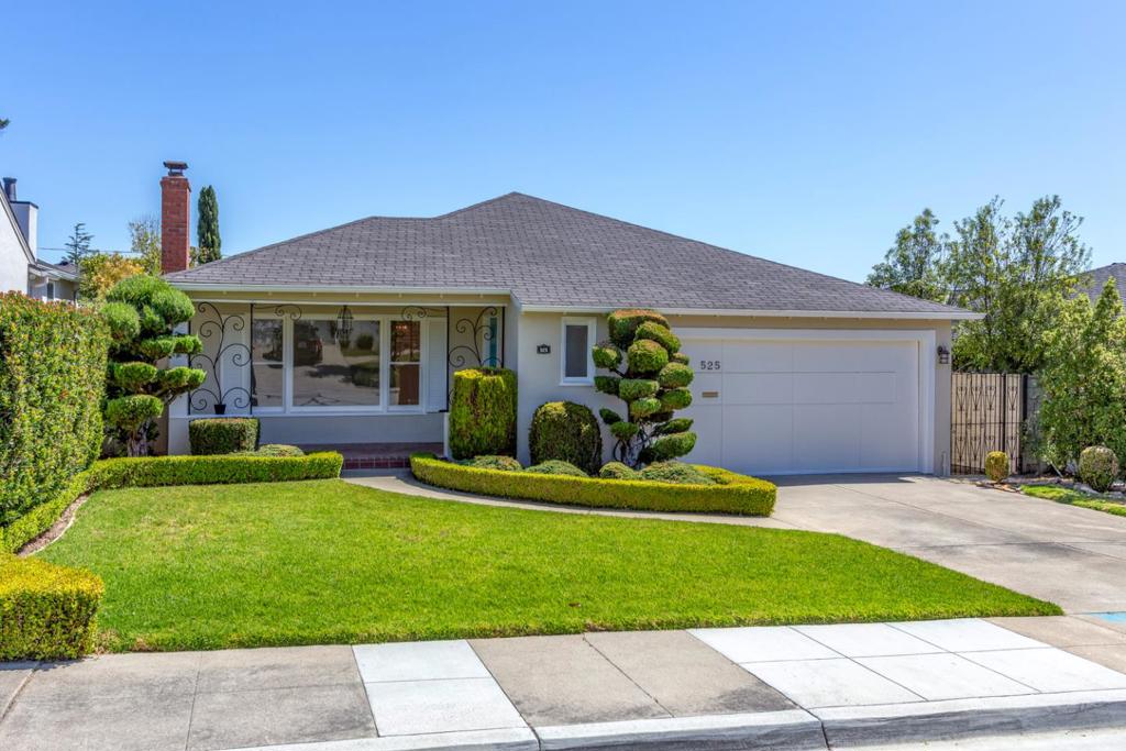 Light-Filled and Spacious Baywood Knolls Gem! Located in desirable Baywood Knolls, just minutes from shopping and dining in vibrant downtown San Mateo, this lovely home offers timeless appeal for comfortable living today, and potential to transform into a dream home. Beautiful hardwood floors enhance the light-filled interiors, where a spacious living room with fireplace flows to a formal dining room and bright eat-in kitchen. Three bedrooms include a primary suite, while a spacious hallway bath serves two additional bedrooms and the main living areas. Outdoor living is inviting with a welcoming covered front porch and landscaped front and rear yards framed by lush gardens. An attached two-car garage with laundry area adds convenience, and excellent nearby San Mateo schools complete this wonderful opportunity.