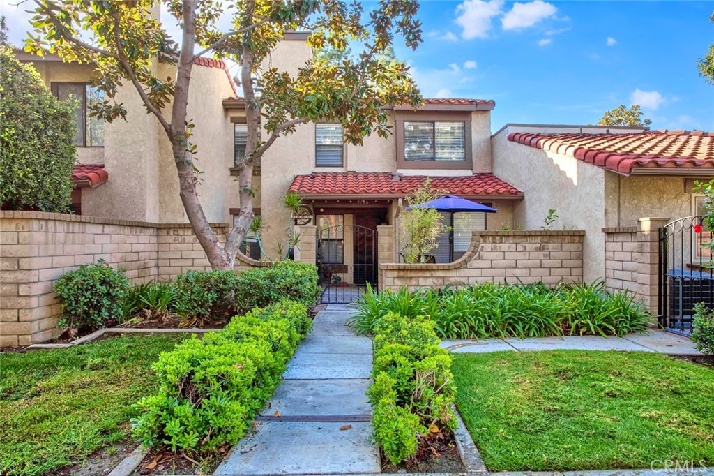 FANTASTIC OPPORTUNITY to live in the Marlborough Villas in the highly sought out Rancho Cucamonga city! Centrally located by schools, grocery stores, parks and restaurants! Enjoy living in the Marlborough community offering pool, spa, two tennis courts and amazing clubhouse! Imagine walking into your new home and feeling the warmth of the fireplace heating the spacious living room to relax and unwind. Just around the corner you'll be pleasantly excited to see the upgraded kitchen with granite counter tops, stainless steel appliances, recessed lighting and plenty of cabinet space! Just off the kitchen you have your laundry room that has direct access to your TWO car attached garage! The dining area and half bathroom complete the downstairs of the AMAZING home! Upstairs you'll find TWO master bedrooms with gorgeous renovated bathrooms, perfect if guest are in town and needing their privacy! Great location! Beautiful scenery! Come View Today!