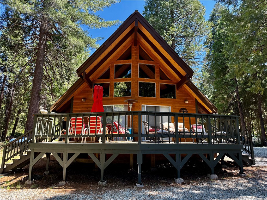 Discover the charm and tranquility of mountain living with this inviting single-family A-Frame home offering a perfect blend of comfort, and amazing location sitting on the Meadow. The natural beauty is ideal for those seeking a peaceful year round retreat or second home. And invite your friends to come stay with an RV hook-up. Open living and dining areas and a kitchen with plenty of storage and laundry in the kitchen area. The comfortable bedrooms are updated and the main bedroom is located on the 2nd floor all to itself. Detached garage along with generous space for parking your toys and the expansive outdoor area is perfect for gardening, gatherings at the permanent fire pit, or simply enjoying the serene mountain atmosphere and abundance of wildlife visits. Location Benefits: Nestled in a quiet, scenic neighborhood surrounded by mature pines with county plowed roads and and a jaunt down highway 44 East to the entrance to Lassen Volcanic National Park—enjoy hiking, camping, and year-round outdoor adventures. Experience the best of Shingletown living for yourself and why this property stands out as a unique find in the area.
