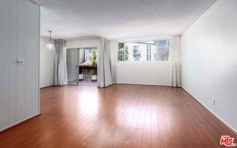 Photo of 6050 Canterbury Drive #E214, Culver City, CA 90230 (MLS # 26852201)