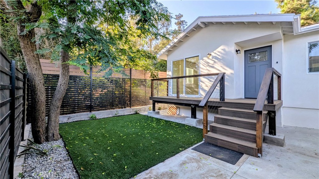 Welcome to this newly built detached ADU, ideally located in the heart of Highland Park near York Blvd's trendy shops and eateries. This bright and spacious home features 2 bedrooms, 2 bathrooms, and modern design throughout. Step inside to discover a spacious open floor plan that integrates the living, dining, and kitchen areas. The kitchen showcases sleek white cabinets with sophisticated dark hardware, stainless steel sink, oven, stove, and dishwasher, and beautiful countertops. The main bedroom suite is complete with a generous walk-in closet, private bathroom with walk-in shower, bay window, and sliding doors for patio access. Enjoy the warmth of luxury vinyl plank flooring and stylish bathrooms with decorative tile, complemented by recessed lighting throughout the home. Strategically placed cooling and heating units will keep you comfortable year-round. Convenient stackable washer/dryer hookups and storage shelving in a hall closet. Outside, the property offers a private front yard and rooftop solar panels. You'll also benefit from two designated tandem parking spaces under a carport. This charming standalone home offers the privacy and comfort of no shared walls, unlike typical apartment or condo living. Tenant responsibilities include electricity, gas, trash, and renter's insurance. The landlord covers water and gardening maintenance. Pets will be considered. Minimum one-year lease term. Don't miss out on this incredible opportunity to make this your home sweet home.