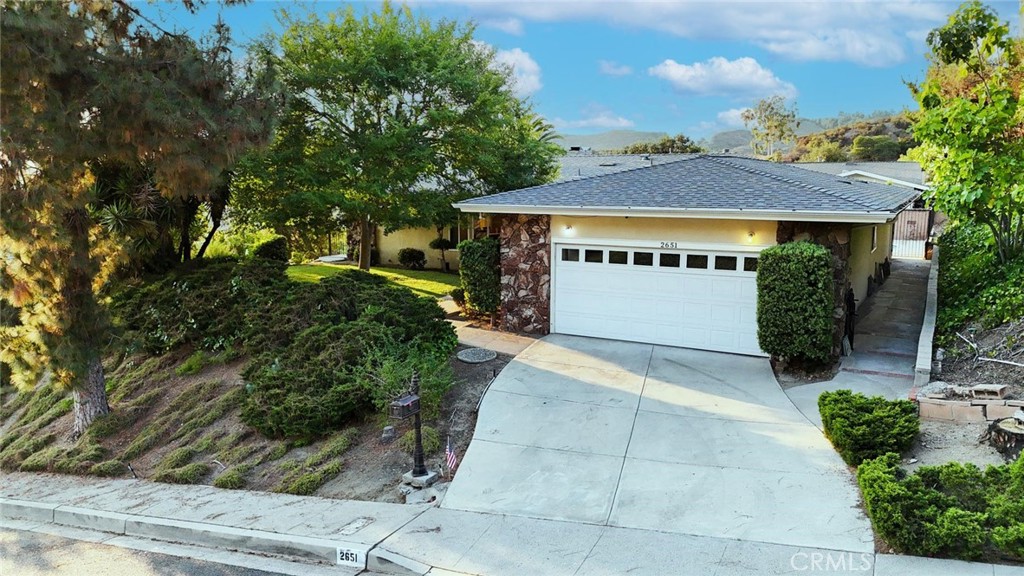 Discover your dream retreat in the heart of Glendale’s serene Glenoaks Canyon. This beautifully maintained 3-bedroom, 2-bathroom home offers the perfect blend of space, comfort, and spectacular views.
Step inside to find a generous layout featuring a large living room, a separate oversized family room, a formal dining area, and a spacious kitchen with its own breakfast nook. The primary suite boasts a walk-in closet and private bathroom with dual vanities, while two additional bedrooms share a well-appointed full bath with a stall shower.
Enjoy indoor-outdoor living at its finest with a sparkling swimming pool and sweeping views of the canyon and downtown Glendale—absolutely stunning at sunset and in the evenings. With a recently replaced roof
and a quiet hillside location, this home checks
all the boxes.