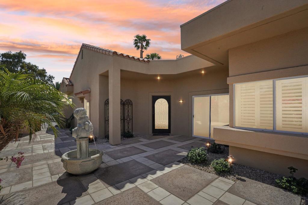 Newly remodeled, move in ready Mission Hills pool home. Sweeping views of the golf course from your premium lot with tee box location. Gorgeous outdoor living space with salt water, heated pool, drought resistant landscape, fire pit, and bbq entertaining area. Inside, new flooring, new kitchen, updated bathrooms, and open spaces. In the kitchen are new cabinets and countertops. Viking appliances, and a view corridor to the pool area and golf course. Living room has tall ceilings, fireplace, stack stone above entertainment cabinets, and sliding doors leading to the patio. Primary is a large bedroom with updated bathroom and guest rooms share an updated guest bath. Three car garage with ample storage. Private, gated entrance. Mission Hills is on of the most prestigious country clubs and golf courses. The home to professional golf tournaments, gorgeous amenities and remodeled club house make it one of the most desirable places to live in the desert.