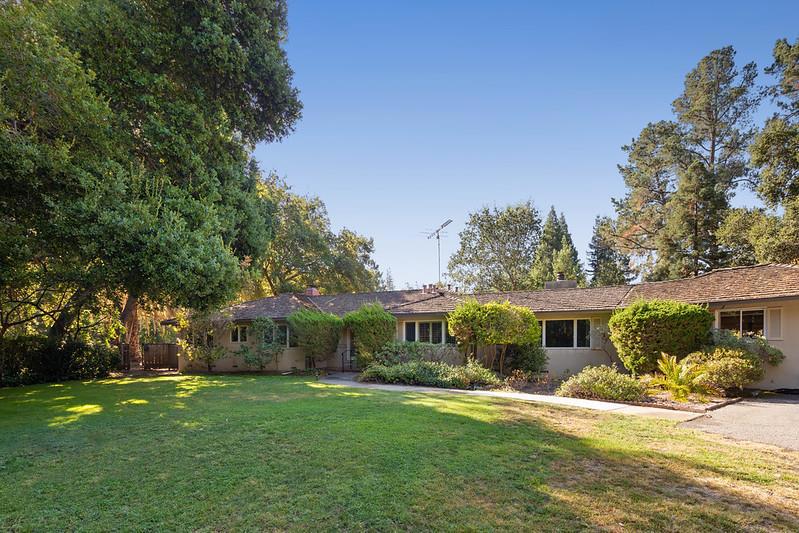 Excellent opportunity to own a premium parcel of land in coveted central Atherton on approximately 1.22 acres. Set back from the street in a flag lot position at the end of a cul-de-sac with complete privacy. Planning study by Pacific Peninsula Architecture available with MFA including ADU of 10,366 SF / 10,766 SF above ground. (Buyer to confirm with the Town of Atherton) Existing mid-century 4-bedroom, 2.5-bath home on the lot. Swimming pool was drained and has holes in it to prevent it from "popping" There is a tennis court (two fences removed and surface has many cracks). Garage was converted into a playroom. Outstanding Las Lomitas School District. Located in the #1 ZIP code in America close to Stanford University, Sand Hill Road venture capital centers, and Silicon Valley tech companies.