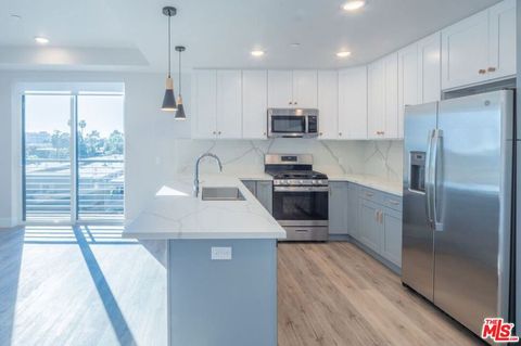 Photo of 3672 Jasmine Avenue #303, Palms, CA 90034 (MLS # 26857595)
