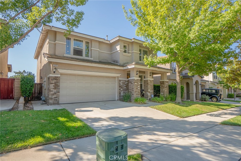 Hurry to see this amazing Chapman Heights home with brick accents on the 7th green of the Yucaipa Valley golf course! With fresher interior paint in neutral colors, this home is sure to impress with polished marble flooring, stainless appliances and an island kitchen with granite countertops. Upgraded crown moulding in all areas, updated bathrooms and new lighting including can lighting make this a must see. The family room off the kitchen with a fireplace and cherrywood flooring makes this the gathering place with views of the golf course. Upstairs has cherrywood flooring in the high traffic areas and has a second family room along with 3 bedrooms and 2 baths. 4 chandeliers, washer, dryer and fridge can be included! Hurry, before it's gone!