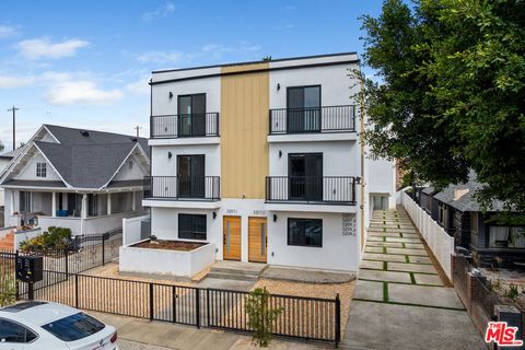 Photo of 3207 W 18th Street #3 and 4, Los Angeles, CA 90019 (MLS # 25620807)