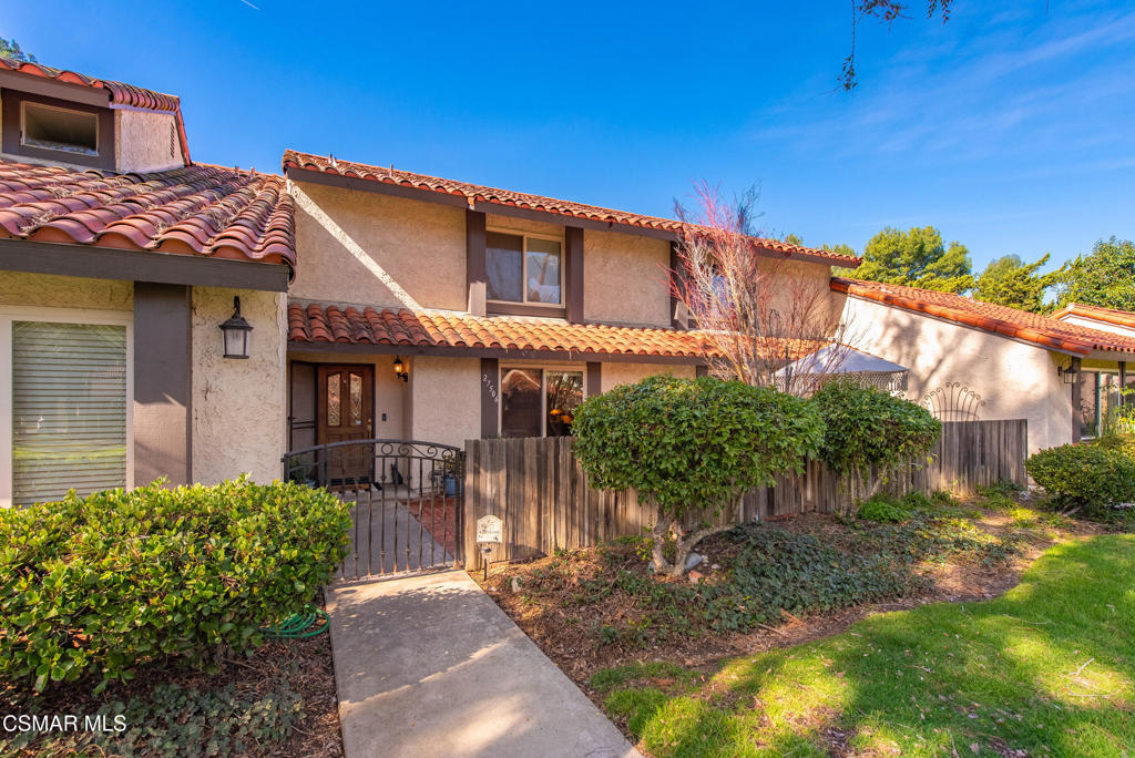 Beautiful home nestled in Agoura Hills. As you walk to your front door you are welcomed with a gated porch area to relaxand stare out at the green belt. Inside, boast wood floors, a cozy living room, 3 bedrooms, 3 bathrooms, and a dining area. The kitchen has tilecountertops and stainless steel appliances. French doors lead to the backyard with a quaint patio area for entertaining. Attached two-car garage,and community amenities including a clubhouse, tennis court(s), barbeque, pool, and spa. Enjoy your new home located near Old Agoura, schools,and the 101 Freeway.