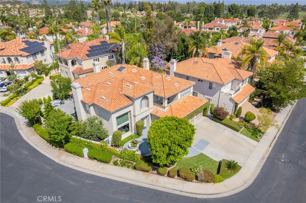 Exceptional Opportunity in Tustin Ranch!
If you enjoy entertaining, this may be the home for you. Located behind the 24-hour guard-gated Township Gate and across from Tustin Ranch Golf Club, 2155 Chandler is the largest floor plan in the San Marino community—offering 4,314 sq ft on a spacious, private corner lot siding to a cul-de-sac.
This beautifully remodeled home features 4 bedrooms and a retreat, 4.5 baths, a bonus room, and an office (ideal as a music room). Soaring two-story ceilings, dramatic double-door entry, porcelain tile flooring, and custom lighting create a grand, elegant atmosphere enhanced with a walk-in wine cellar. Downstairs guest bedroom with an ensuite bathroom plus a beautifully remodeled powder room nearby make it perfect for guests or in-laws.
The interior atmosphere is elevated by a gourmet kitchen boasting a waterfall island, stainless steel appliances, wine cooler, custom backsplash, double ovens and artistic lighting.
French doors allow for a seamless transition to a fully hardscaped backyard designed for entertaining—complete with a built-in BBQ island, custom waterfall, firepit with seating, TV area, and lush landscaping.
Close access to The Tustin Marketplace and scenic Peters Canyon Trail-this home delivers the ultimate Southern California lifestyle.
Additional Highlights:
Low HOA Dues: $159 + $125 = $284 monthly
No Mello Roos
Basic Tax Rate 1.04%
Top-rated TUSD schools: Ladera, Pioneer, Beckman
Come See....