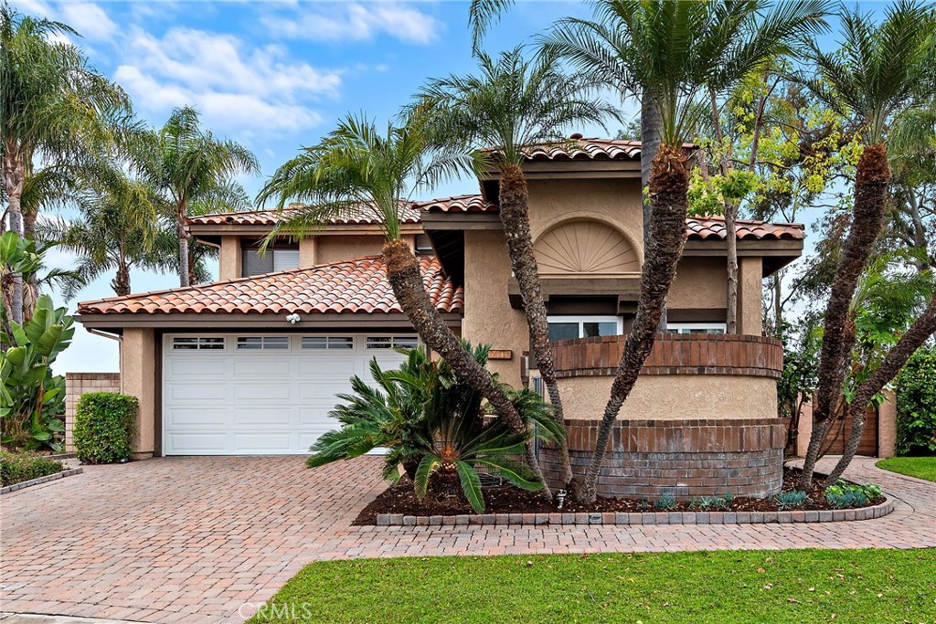 INCREDIBLE PRICE IMPROVEMENT. PRICED TO SELL! This remodeled gem, located in the gated, established, family oriented, beautifully manicured and desirable community of Falcon Hill in Laguna Hills, is a must see. Step inside and be greeted by an open-concept floor plan, that seamlessly connects the kitchen, dining, and living spaces, all under gorgeous cathedral ceilings. The amazing natural lighting throughout, adds to the warm appeal of the entire interior. The property features large, windows throughout, and 2 skylights.
This 4 bedroom home has a large bottom floor Master Bedroom retreat with wood beams, and a cathedral ceiling, leading into the beautiful bathroom with original terra cotta flooring, and unique, well kept countertops, bath surround, and shower. The 3 additional bedrooms on the second level, offer nice sized rooms with beautiful natural lighting, new mirrored closet doors and closets, one with a custom-built in office space. The property originally had 3 fireplaces (master, main living room, and secondary living room), currently covered with drywall, however still functional and can be exposed by a contractor on your end, if desired. Sold as is.
The overall renovations, includes: new premium natural wood flooring throughout, new baseboards, fresh interior paint, new electrical, new kitchen appliances, modern ceilings fans, water heater with expansion tank, HVAC, water softener, recessed lighting, reverse osmosis filtration, updated upstairs closets, new doors, bidets attached to each new toilet, electric vehicle charger, and epoxy flooring in the two-car garage. The property sits in a cul-de-sac, with beautiful trees, well manicured neighbor properties, and features a wrap around large backyard with newer concrete, with palm trees. The possibilities for entertaining are endless! Winning school district, close to shopping, restaurants, I-5 and the 73 toll road. Don't miss the opportunity to own this gem in one of Laguna Hills most prestigious neighborhoods. Properties in this community do not become available often.