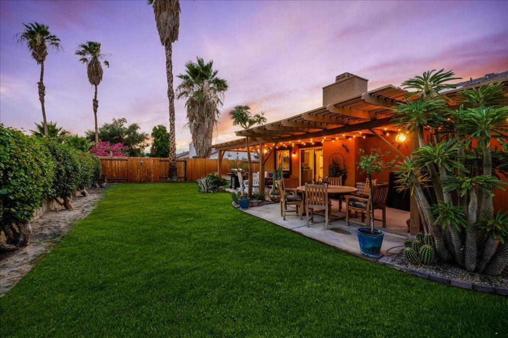 Welcome to a partial furnish rental in North La Quinta. Brand new beds and TV. This inviting home features a brand-new roof, fresh exterior paint, and beautifully refinished Saltillo tile flooring that exudes warmth and rustic charm enhancing functionality for everyday living. The floor plan offers comfortable flow and flexible space for relaxing or entertaining. There is an office space that can easily be converted to a fourth bedroom (has closet). Stepping out to the backyard you are greeted by a backyard oasis, with lush landscaping, a covered awning that stretches full length of the home, upgraded fencing and magical lighting. You will dream of sitting under the patio and taking in the breathtaking sunsets. Surrounded by top-rated IB program schools, nearby parks, and close to shopping, dining, and entertainment.
