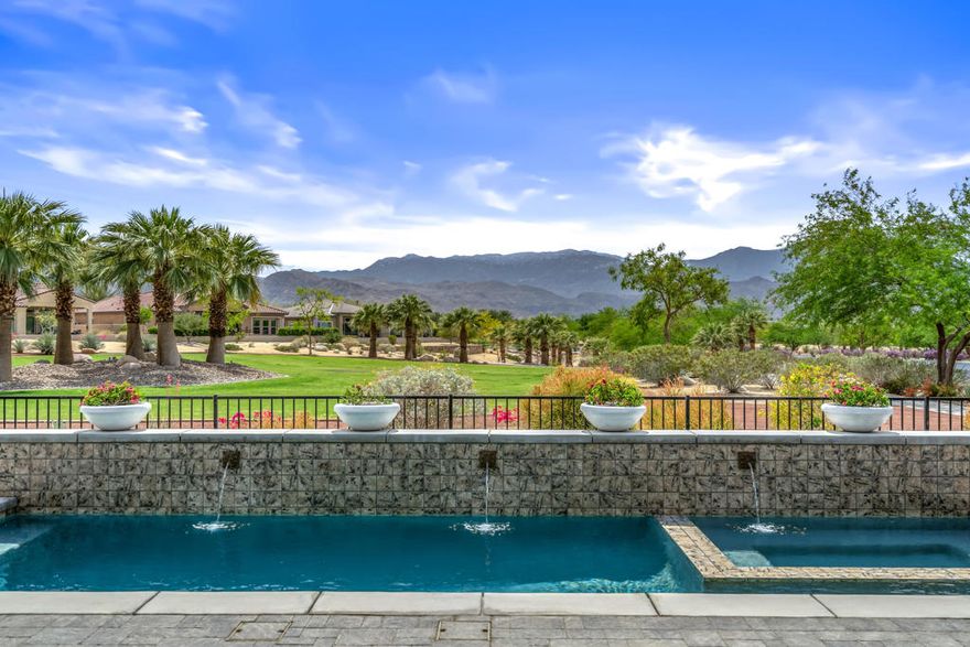 Located in the desirable 55+ community of Del Webb Rancho Mirage, this beautifully upgraded Journey model offers a thoughtful blend of design, comfort, and truly incredible views. Perched on a premium lot backing to a quiet greenbelt, the backyard captures sweeping 230 mountain vistas, with the Santa Rosa and San Jacinto ranges as your daily backdrop.Inside, the open-concept floor plan is filled with natural light thanks to multi-panel sliding glass doors, transom windows, and high coffered ceilings throughout the main living areas and primary bedroom. The kitchen is a true centerpiece--equipped with a quartz waterfall island, KitchenAid appliances, ceiling-height cabinetry, and refined finishes that make cooking and entertaining a pleasure.Every detail of the build-out was selected with care to offer both style and function. Upgrades include a Lutron smart lighting system, hard-wired security, and custom cabinetry in both the butler's pantry and laundry room. The primary suite opens directly to the backyard and features a spa-like ensuite bath and large walk-in closet. Guests will love the private bedroom with its own access to the interior courtyard--an inviting and quiet place to relax. Step outside to your own desert retreat, complete with a Pebble Tec saltwater pool, new salt cell, and several outdoor seating areas perfect for everything from sunbathing to sunset dinners. The views evolve throughout the day, offering a stunning desert backdrop that feels different and beautiful at every hour.As a resident of Del Webb Rancho Mirage, you'll enjoy resort-style amenities including a clubhouse, fitness center, pools and spas, tennis and pickleball courts, scenic walking trails, and an active social calendar--all within a gated, well-maintained community.This is a rare opportunity to own a thoughtfully upgraded home with unforgettable views in one of the desert's most sought-after 55+ communities.