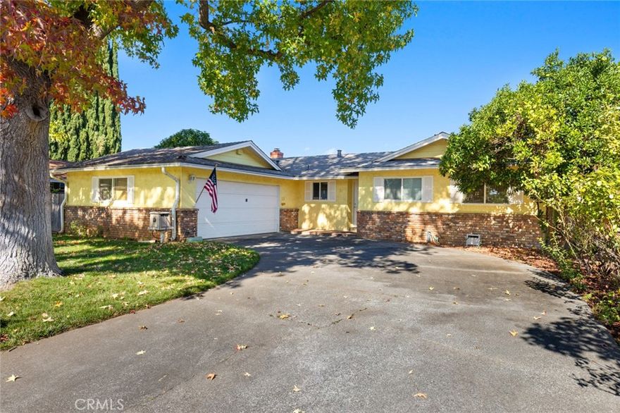 Nestled near the end of a charming cul-de-sac in a well-established neighborhood, this inviting home offers comfort, character, and an unbeatable location. Just minutes from shopping, schools, and easy freeway access, it’s the perfect blend of peaceful living and everyday convenience.
Inside, you’ll find a warm and functional layout with multiple living spaces. The kitchen features Corian counters, wood cabinetry, tile flooring, and a newer refrigerator, opening to a dining area that flows into a cozy family room with a beautiful gas fireplace as the focal point. French doors lead to a spacious covered patio and a private backyard—ideal for relaxing or entertaining.
A separate living room offers hardwood flooring and serene backyard views, providing additional space for gathering or quiet evenings at home.
Down the hall, you’ll find two guest bedrooms with original built-in closets and drawers, a full guest bathroom with tub/shower combo, and a generous primary suite with its own bathroom, walk-in shower, and direct access to the patio.
Other highlights include a two-car garage with laundry area, ample storage space, including a backyard shed, dual-pane windows throughout, ceiling fans, and appliances included.
This home has been well cared for over the years and offers a solid foundation for its next owner to make it their own. A great opportunity to own a home in one of the most convenient locations in a classic Chico neighborhood!
