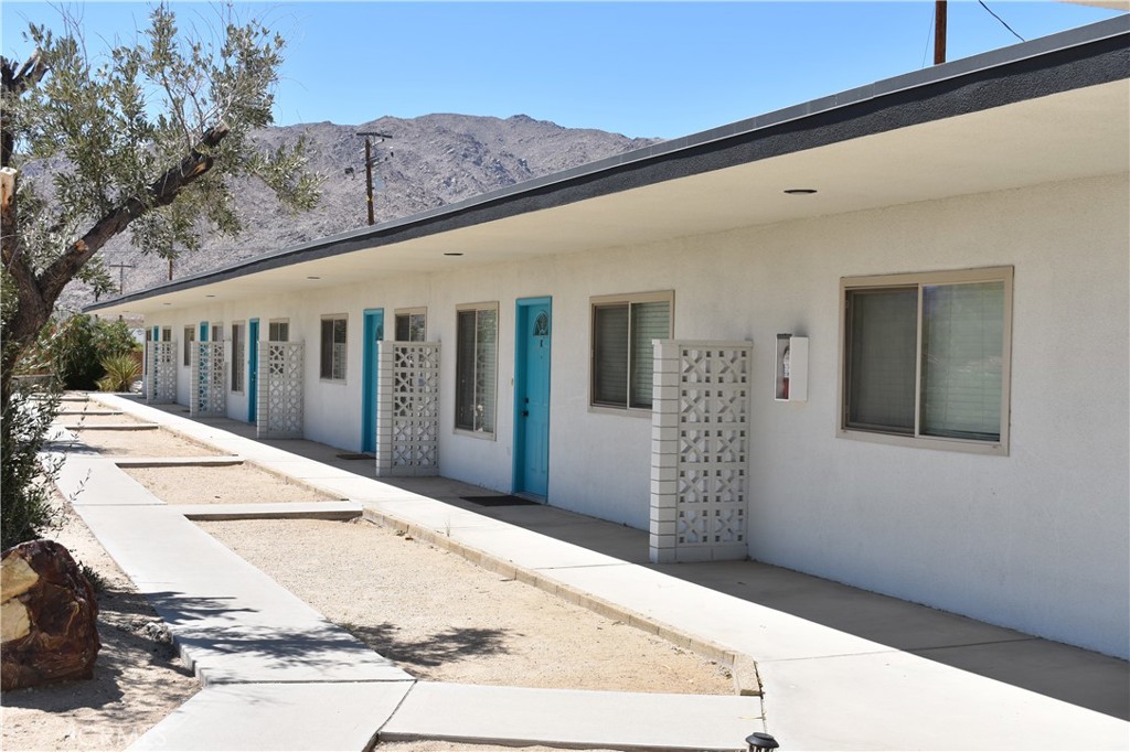 This Six (6) + One (1) Unit Property is located at 73636 Cactus Drive, Twentynine Palms, CA 92277. The property is comprised of Six (6) One-Bedroom / One-Bathroom Units and One (1) Non-Conforming Studio, which was converted from a previously existing Two-Bedroom / Two-Bathroom layout. The buildings total approximately 3,860 square feet and sit on a 0.790 Acre Lot. Originally constructed in 1965, the property has undergone recent renovations including new exterior paint, dual-pane vinyl windows, mini-split installations in select units, a recently paved driveway, and a roof that was replaced within the past few years. One of the property's most compelling features is its DT (Downtown) zoning, which may allow for additional unit development or future site expansion — offering investors a rare opportunity to unlock hidden value and boost long-term returns (buyer to verify with the City).