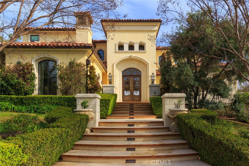 Welcome to Villa Duomo, a breathtaking cathedral inspired estate designed for grand entertaining and luxurious living. This custom built masterpiece blends old world architectural elegance with modern amenities offering an unparalleled lifestyle experience.
Situated on a premier Westridge Estates homesite offering unmatched views of the mountains and golf course, every detail of the almost 12,000 SF home was thoughtfully chosen. When one can have anything when building a home they include a chandelier pulley system, a tub crafted from a solid piece of onyx, a 3 floor elevator, and custom hand carved European marble mantels.
Soaring ceilings, exquisite craftsmanship and expansive spaces set the stage for unforgettable gatherings. Two kitchens, 2 full bars,and a large butlers pantry make it ideal for hosting on any scale.
Sports enthusiasts will appreciate the finest indoor professional pickleball(basketball/volleyball) court in Southern California while the state of the art wellness center provides a private retreat for relaxation and fitness. Sauna, steam and massage rooms, plunge pool, fitness center and dual bathrooms creates a stay at home oasis.
Floor to ceiling glass doors frame the stunning mountain and golf course views creating a seamless connection between the indoors and the natural beauty beyond. The estate also features garage parking for 5 to 6 cars ensuring ample space for a collector.
Designed for those who appreciate sophistication, comfort and entertainment. Villa Duomo is more than a home, it’s a lifestyle. It’s a statement of elegance, sophistications and unparalleled value.