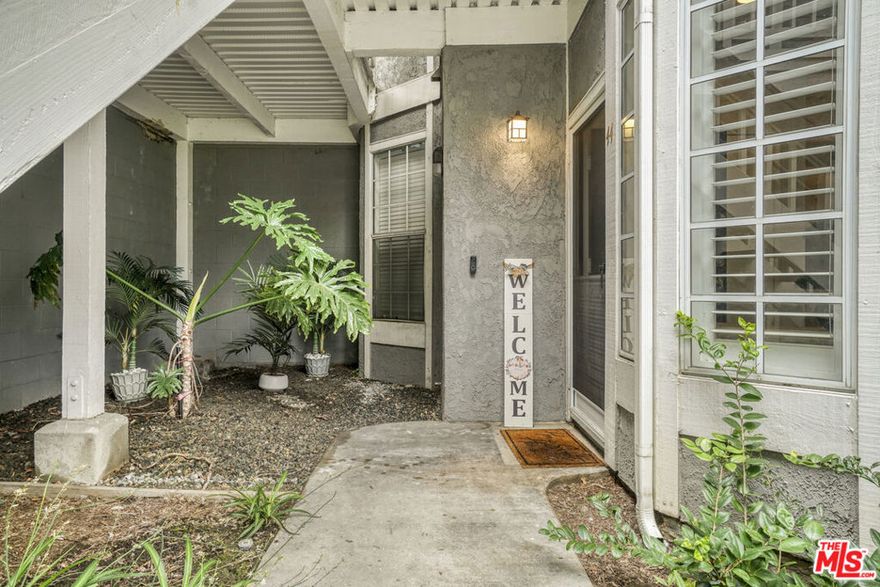 This turnkey condo in the gated community of Greenbrier Terrace offers modern comfort in an excellent location. Featuring significant updates throughout, this spacious 2 bedroom 2 bathroom condo sits on the pool level and is truly move-in ready. Enjoy hardwood floors in both bedrooms, a completely redesigned kitchen and laundry area with barn doors, stylish new recessed and bar lighting, and fully remodeled bathrooms with new vanities, flooring, toilets, and showers. The primary suite includes a refreshed closet with custom storage and new doors, creating a polished and functional retreat. Large windows and sliding doors fill the home with natural light, while smooth ceilings and updated finishes add a bright, open feel. Central heating and air conditioning provide year-round comfort, and the spacious 2 car garage offers plenty of parking and storage. The Greenbrier Terrace community features pools and spas and is conveniently located near top-notch shopping and dining. This is a move-in ready home with an ideal layout, great unit positioning, and all the right upgrades.