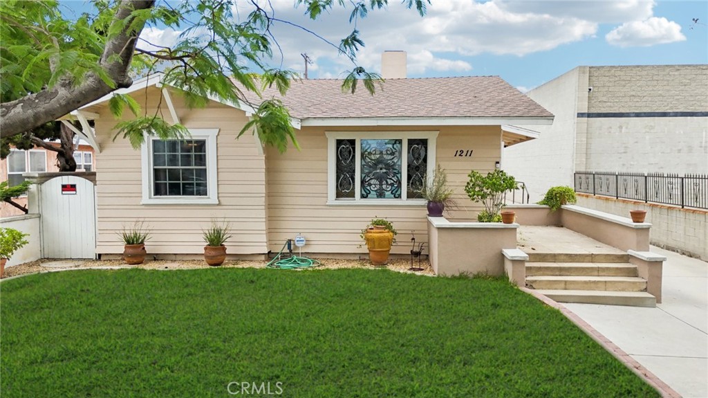 Where charm meets opportunity (and zoning gets exciting)
Looking for a home that works as hard as you do? Welcome to 1211 252nd St—a 3-bed, 2-bath Harbor City haven with more potential than your average address. Nestled on a generous lot with LAM1 zoning (yep, that’s Limited Manufacturing), this spot isn’t just residential—it’s ready to hustle. Live in it, work from it, create from it… all without compromising comfort or charm.
Step inside and you’ll find touches of vintage character—hello, leaded glass designer windows—blended with modern updates, like an upgraded kitchen and formal dining area that’s just waiting for dinner parties (or spreadsheets, if your “home office” leans business).
Out back? You’ve got alley access and plenty of space for an RV, work truck, or equipment—plus a 2-car garage to keep things tucked away and tidy. Whether you're dreaming of a creative studio, a small-scale business HQ, or just love having options, this lot delivers.
So go ahead—bring your vision. Residential comfort meets light industrial flexibility in a way that’s rare, real, and ready to roll.
But don’t sleep on it—zoned opportunities like this don’t come around often.