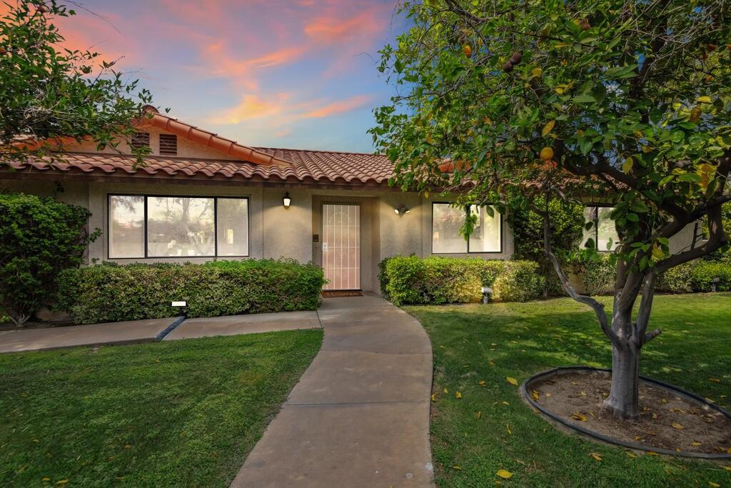 First time on the market! Family home for 40 years! This stunning 4-bedroom, 3-bath Spanish-style home in Palm Springs offers timeless charm, modern comfort, and NO HOA. Situated behind a whitewashed privacy wall with a gated driveway entrance, the fully fenced lot provides complete seclusion and peace of mind.Enter inside to an open floorplan filled with natural light, ceramic tile flooring throughout, and a charming fireplace in the main living area. The spacious kitchen overlooks the living and dining areas, with a glass slider leading directly to your private backyard oasis.Enjoy the true Palm Springs lifestyle in a yard made for entertaining--featuring a sparkling pool, relaxing jacuzzi, sunning area, and outdoor dining space. Mature fruit trees add character and shade, creating a perfect setting for gatherings or quiet afternoons.All four bedrooms are generously sized, including the private primary suite with its own ensuite bath. This is a rare opportunity to own a well-maintained, classic home in a prime location--don't wait! Schedule your private showing today.