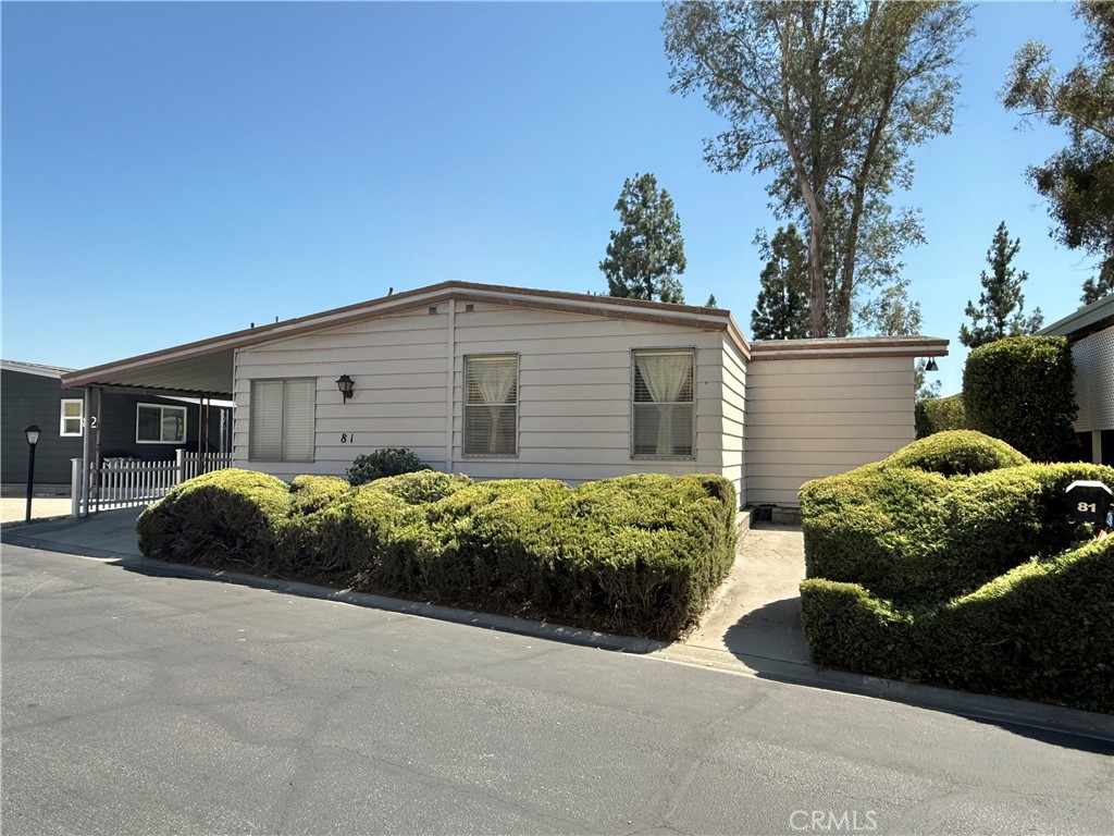 Welcome to this 1,632 SF home in one of the most prestigious 55+ communities in the Inland Empire, perfectly situated in Highland with sweeping views of the valley. Located close to the community clubhouse, this property combines comfort, space, and a truly special setting. Enjoy a roomy formal living area and a cozy family room conveniently located next to the kitchen, perfect for both entertaining and everyday living. The home retains many of its original features, giving it a charming, well-kept character and providing the perfect opportunity to add your own personal touch. The master suite includes a walk-in closet and a generous en suite bathroom with dual vanities, a relaxing soaker tub, and a walk-in shower.
Step out to the covered side patio and enjoy stunning sunsets and twinkling city lights at night. This home offers timeless appeal in a highly sought-after community—ready for you to make it your own.
