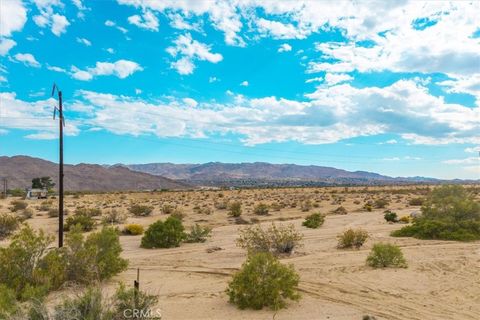 Photo of 5858 Neptune Road, Joshua Tree, CA 92252 (MLS # JT25101611) Photo of 5858 Neptune Road, Joshua Tree, CA 92252 (MLS # JT25101611)
