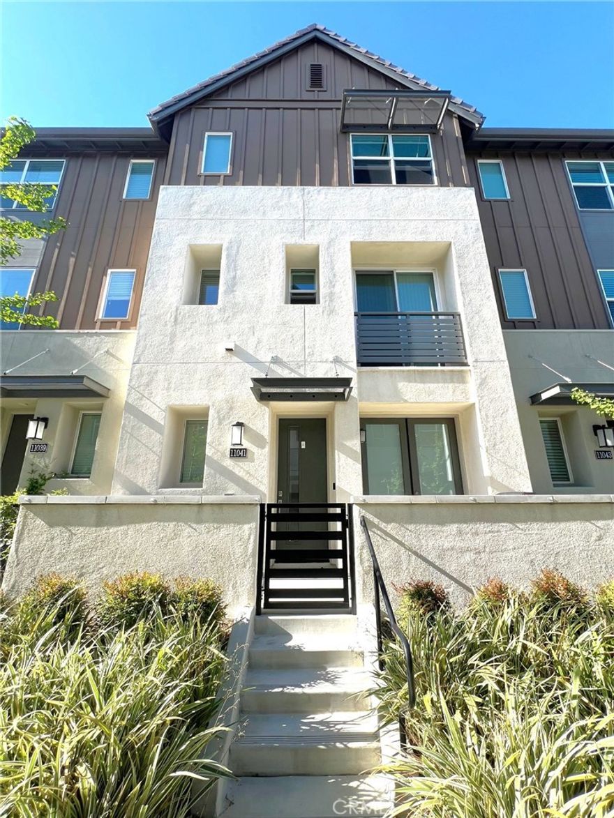 Beautiful 3-Story Townhome with Modern Upgrades in a Resort-Style Community. Welcome to this stunning 3-story townhome offering 1,890 square feet of thoughtfully designed living space. Featuring 4 bedrooms, 2 full bathrooms, and 2 half bathrooms, this home perfectly blends modern comfort, functionality, and energy efficiency. The first floor includes a versatile room ideal for a home office or gym, a convenient half bathroom, and access to a charming front balcony and an attached 2-car garage. On the second floor, enjoy an open-concept layout with a spacious living room and a modern kitchen featuring a large island, stainless steel appliances (dishwasher, oven, and refrigerator), and direct access to a private balcony. The balcony has been beautifully upgraded with tile flooring, lighting, and privacy plants, creating an inviting outdoor retreat. A half bathroom on this level adds convenience for guests. The third floor offers three comfortable bedrooms and two full bathrooms, including a master suite with a walk-in closet and private en-suite bath. This home includes several smart and energy-efficient features, such as a smart thermostat, air circulator system, built-in wall wiring for easy TV setup, and smart sockets with USB hookups. Additional highlights include a tankless water heater, water softener system, in-unit laundry, and blinds on all windows for added comfort and privacy. Residents of this resort-style community enjoy access to premium amenities, including a large gated swimming pool area with cabanas and hot tub, a clubhouse, a fully equipped fitness center, BBQ areas, a dog cleaning station, and multiple dog play areas. This townhome offers the perfect combination of luxury, smart living, and community lifestyle—ready for you to call home.