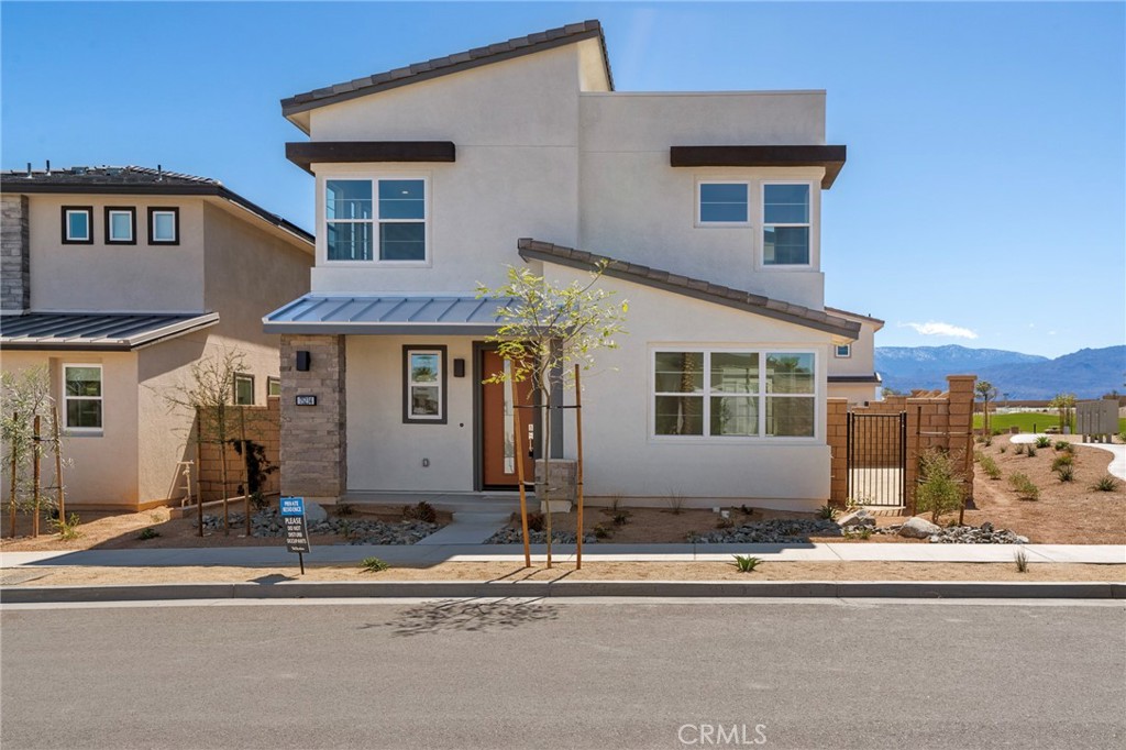 Discover this stunning, brand-new two-story home located in the highly sought-after University Park community in Palm Desert. Boasting 5 bedrooms, 4.5 baths, and a generous 2,537 sq. ft. of living space on a 3,881 sq. ft. corner lot, this home is designed for comfort and convenience. Step inside to find an abundance of natural light streaming through the many windows throughout the home. The modern layout includes 1 bedroom suite with 1 full bath downstairs, perfect for guests or multi-generational living. Upstairs, you’ll find 4 additional bedrooms, including a luxurious primary master bedroom suite and three addtional bedrooms. An expansive loft is the ideal for a home office, play area, or media room. This home comes fully equipped with a washer, dryer, and refrigerator, and tenants will benefit from the included solar system, helping to reduce electricity costs. Situated on a prime corner lot, this property is conveniently located next to The Grove amenities, offering access to a clubhouse, multiple pools, spas, fire pits, pickleball courts, ping pong tables, a playground, and bocce ball courts. Outdoor enthusiasts will also love the proximity to hiking and biking trails, golf courses, and the nearby airport and entertainment venues. Don’t miss the opportunity to call this incredible property your new home. Schedule a viewing today!