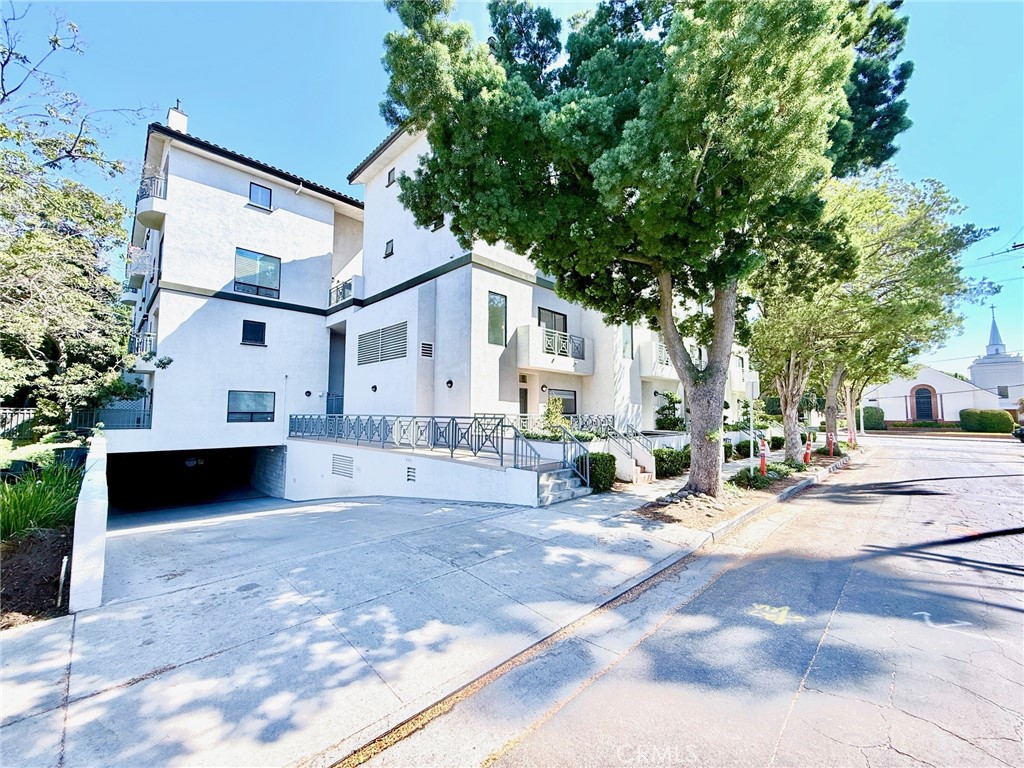 Prime location in the heart of Pasadena! As you enter the gated community, you are greeted with a private courtyard with a professionally maintained garden and water fountain. This adorable home is the end unit offering plenty of natural lighting and boasts a modernized kitchen with gorgeous Quartz countertops, a charming pass-through window, a gas stove & oven, a refrigerator, and a dishwasher. The bright living room has a cozy fireplace, engineered wood flooring, and recessed lighting. It also features two bedrooms, including a Master suite with a walk-in closet and a private balcony, 2.5 bathrooms with updated styling, light fixtures, and mirrors, and a laundry closet near the kitchen for your convenience. This unit includes central A/C & heating and a first-floor outdoor patio area for your enjoyment. 2 assigned parking spaces are available in the subterranean parking garage with additional storage, close to Pasadena Playhouse District, South Lake Shopping Center, Paseo Colorado, and Old Town Pasadena.