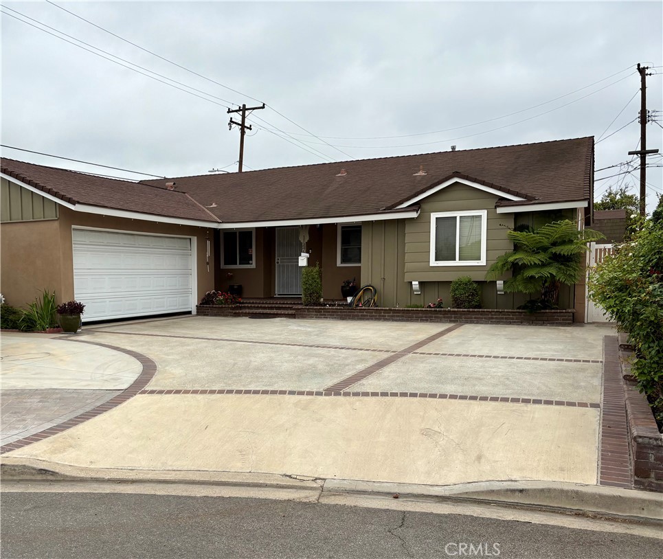 Welcome to this charming single-story home nestled in a cul-de-sac! Featuring 3 spacious bedrooms and 2 full bathrooms, this 1,683 sqft residence is set on an oversized 7,590+ sqft lot offering ample space for outdoor enjoyment and RV parking. Inside, the inviting living room boasts a cozy fireplace, perfect for relaxing evenings and creating a warm, welcoming atmosphere. The home includes brand new carpet in the bedrooms and a flowing floor plan ideal for entertaining guests. Whether you're hosting indoors or enjoying the expansive backyard, this property is ready to accommodate your lifestyle. Located in a desirable neighborhood close to schools, parks, shopping, and more. Don’t miss your chance to own this versatile and beautifully maintained home!Call to schedule your private showing!