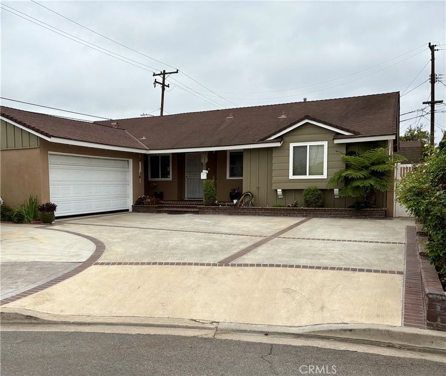 Welcome to this charming single-story home nestled in a cul-de-sac! Featuring 3 spacious bedrooms and 2 full bathrooms, this 1,683 sqft residence is set on an oversized 7,590+ sqft lot offering ample space for outdoor enjoyment and RV parking. Inside, the inviting living room boasts a cozy fireplace, perfect for relaxing evenings and creating a warm, welcoming atmosphere. The home includes brand new carpet in the bedrooms and a flowing floor plan ideal for entertaining guests. Whether you're hosting indoors or enjoying the expansive backyard, this property is ready to accommodate your lifestyle. Located in a desirable neighborhood close to schools, parks, shopping, and more. Don’t miss your chance to own this versatile and beautifully maintained home!Call to schedule your private showing!
