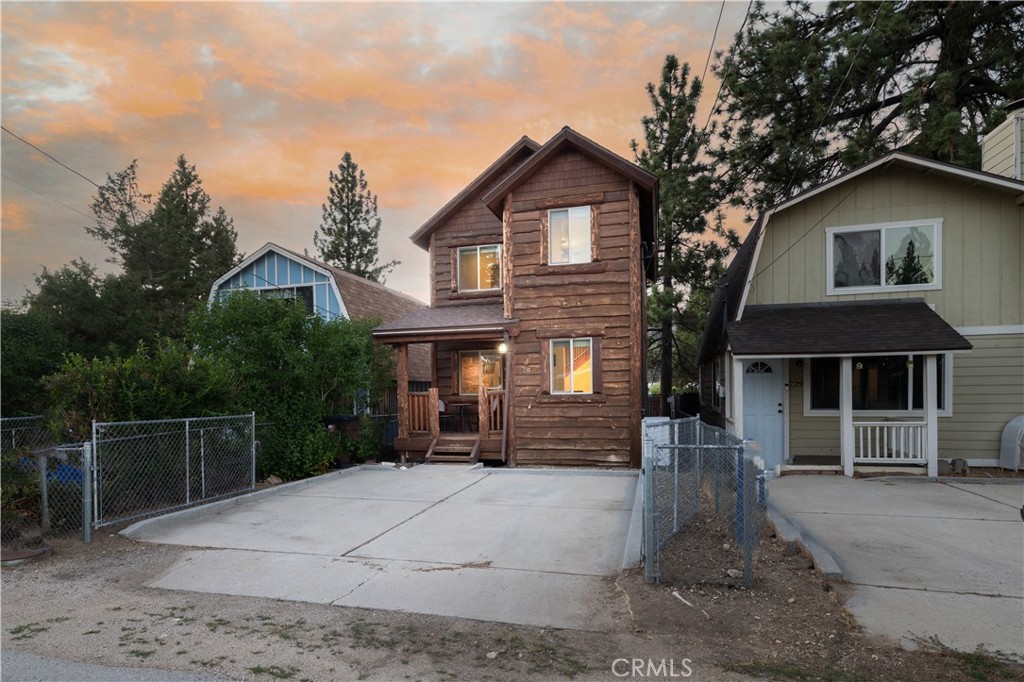 Welcome to your Big Bear home! A newer 2-bed, 2-bath custom cabin just minutes from Big Bear Lake, ski resorts, and everything else Big Bear has to offer. Built in 2015, this move-in ready home features a beautiful stone fireplace, granite countertops, and a cozy layout. Enjoy outdoor living with a covered front porch, spacious back deck, fire pit, and hot tub. Perfect as your full time residence or vacation rental - you can't go wrong with this one!