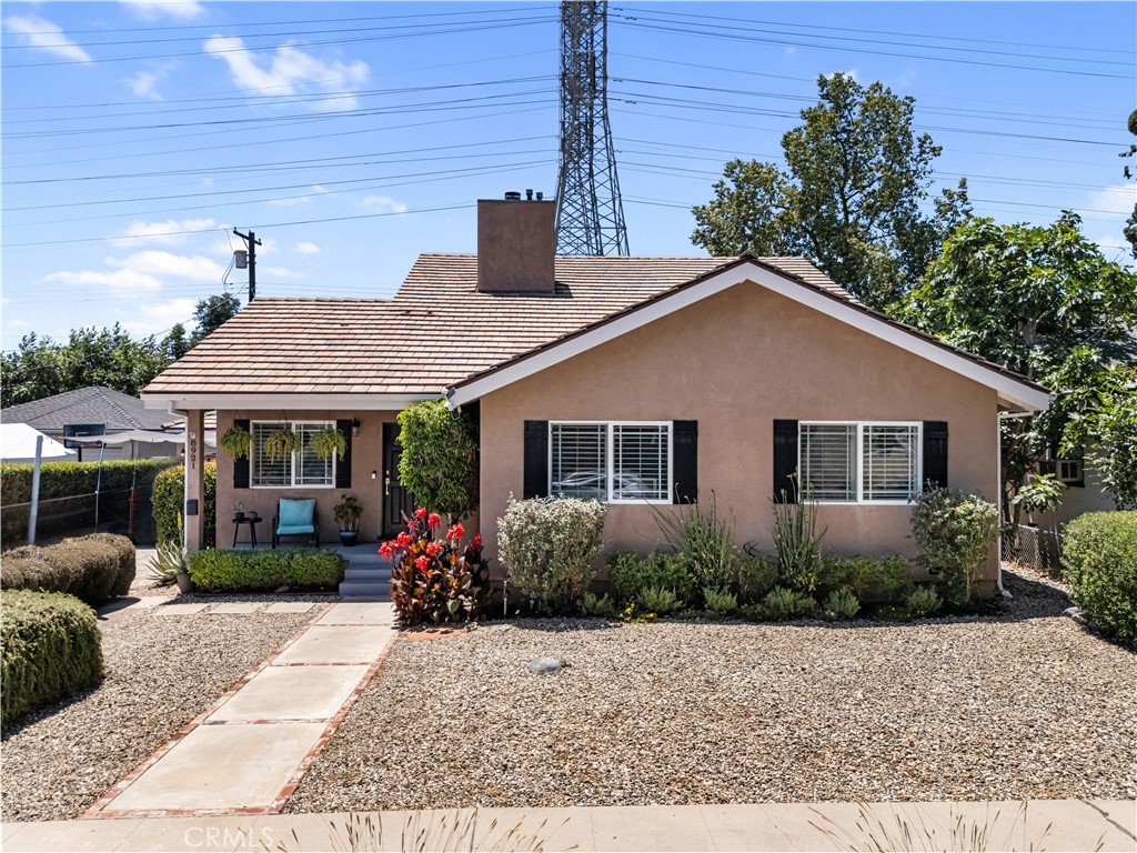Welcome to this beautifully upgraded 5-bedroom, 3-bathroom home offering 2,024 sq ft of comfortable living space on a 6,148 sq ft lot. This property features RV parking and a converted garage that serves as additional living space ideal for guests or a private workspace. Inside the main house, you'll find a thoughtfully remodeled kitchen with granite countertops and upgraded cabinetry, seamlessly connecting to the spacious living room, which features a custom staircase that leads into the master suite. The master suite is a true retreat, boasting a luxurious travertine-mosaic steam shower with multiple sprayers, dual sinks, a freestanding soaking tub, and a walk-in closet. The backyard includes a versatile tool shed, perfect for crafting or storage. Centrally located near CSUN, Northridge Mall, and the renowned Porto's Bakery, this home offers both comfort and convenience in one of Northridge's most desirable neighborhoods.