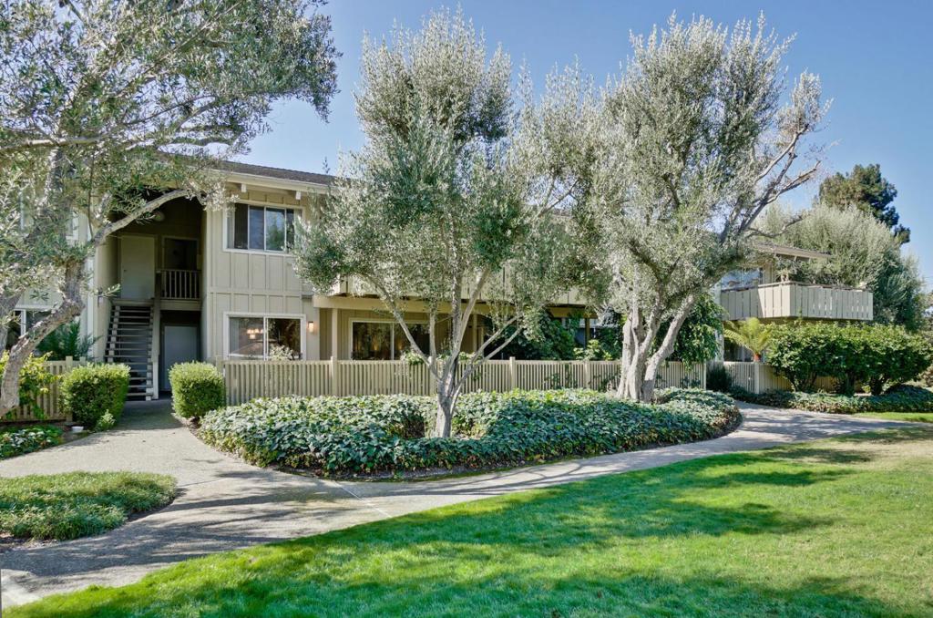 Welcome to 255 S Rengstorff Ave #5, a well-kept first-floor unit nestled in the desirable Parkview West community. Just steps from Rengstorff Park, this home offers a serene setting with lush landscaping, mature trees, two swimming pools, a hot tub, exercise room, and ample guest parking. This spacious 1-bedroom condo features laminate flooring throughout the main living area, a tastefully upgraded kitchen with granite countertops and stainless steel appliances, and a generous patio perfect for relaxing or entertaining. Enjoy the convenience of an assigned carport directly below the unit, along with a large private storage space. With easy access to Central Expressway, Highway 101, and just minutes from Downtown Mountain View and major tech campuses, this location offers both comfort and connectivity as well as excellent Los Altos High school. Don't miss the opportunity to own this charming, move-in ready home in one of Mountain View's most convenient communities!