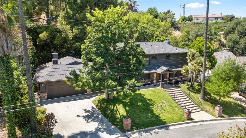 Photo of 20225 Allentown Drive, Woodland Hills, CA 91364 (MLS # SR25170589)
